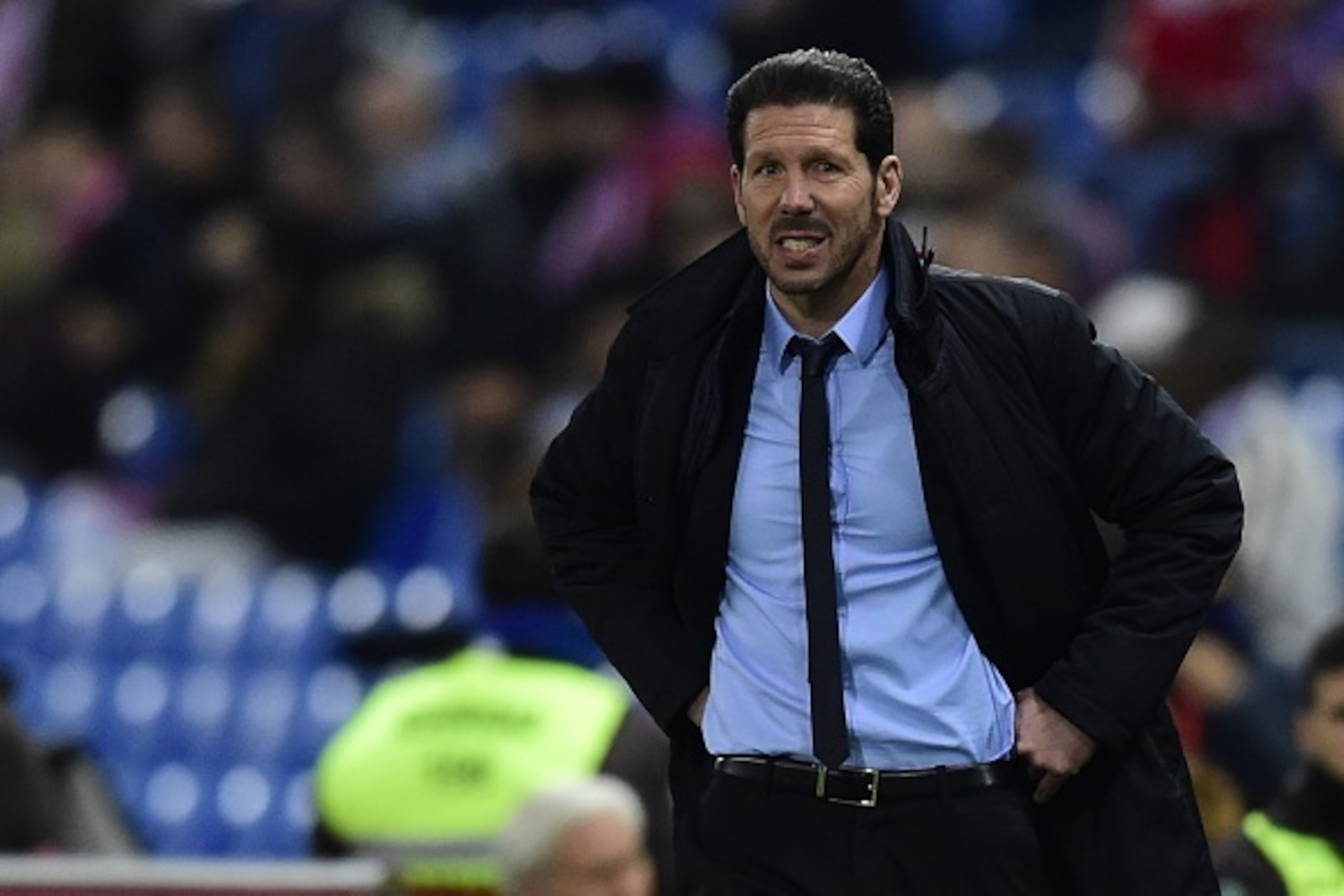 Atletico Madrid's Argentinian coach Diego Simeone looks on during the Spanish Copa del Rey (King's Cup) football match Club Atletico de Madrid VS CF Reus Deportivo at the Vicente Calderon stadium in Madrid on December 17, 2015.   AFP PHOTO / JAVIER SORIAN