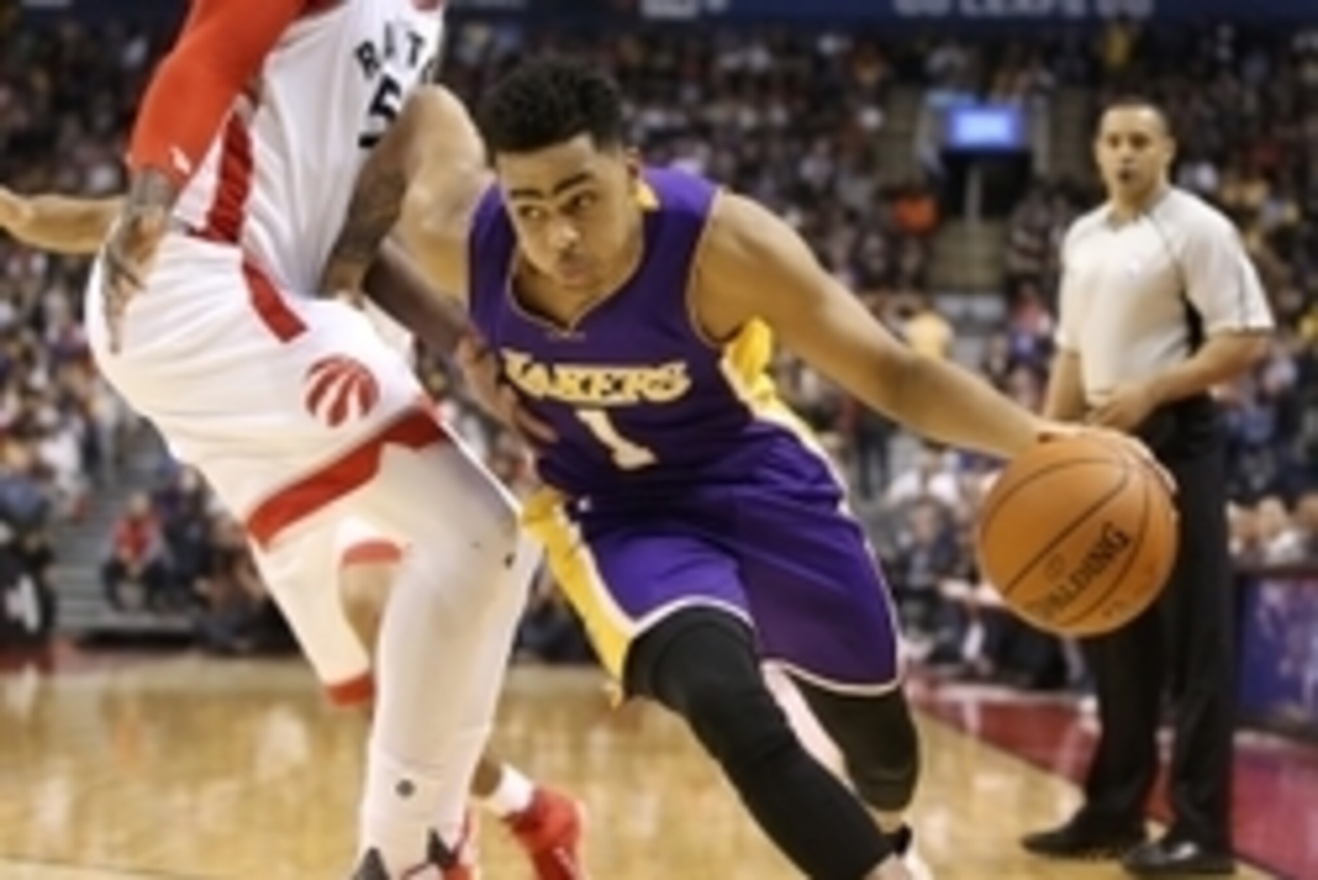 Dec 7, 2015; Toronto, Ontario, CAN; Los Angeles Lakers guard D   Angelo Russell (1) makes a move to the basket against the Toronto Raptors at Air Canada Centre. The Raptors beat the Lakers 102-93. Mandatory Credit: Tom Szczerbowski-USA TODAY Sports