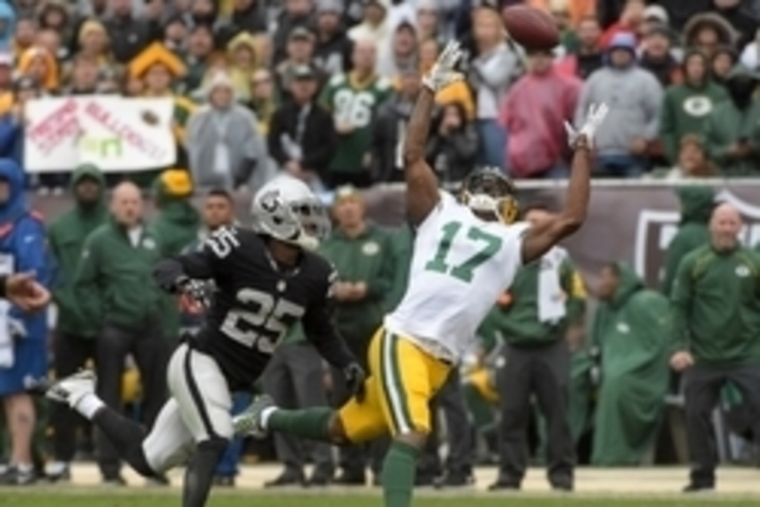 Dec 20, 2015; Oakland, CA, USA; Green Bay Packers wide receiver Davante Adams (17) is defended by Oakland Raiders cornerback D.J. Hayden (25) during an NFL football game at O.co Coliseum. Mandatory Credit: Kirby Lee-USA TODAY Sports