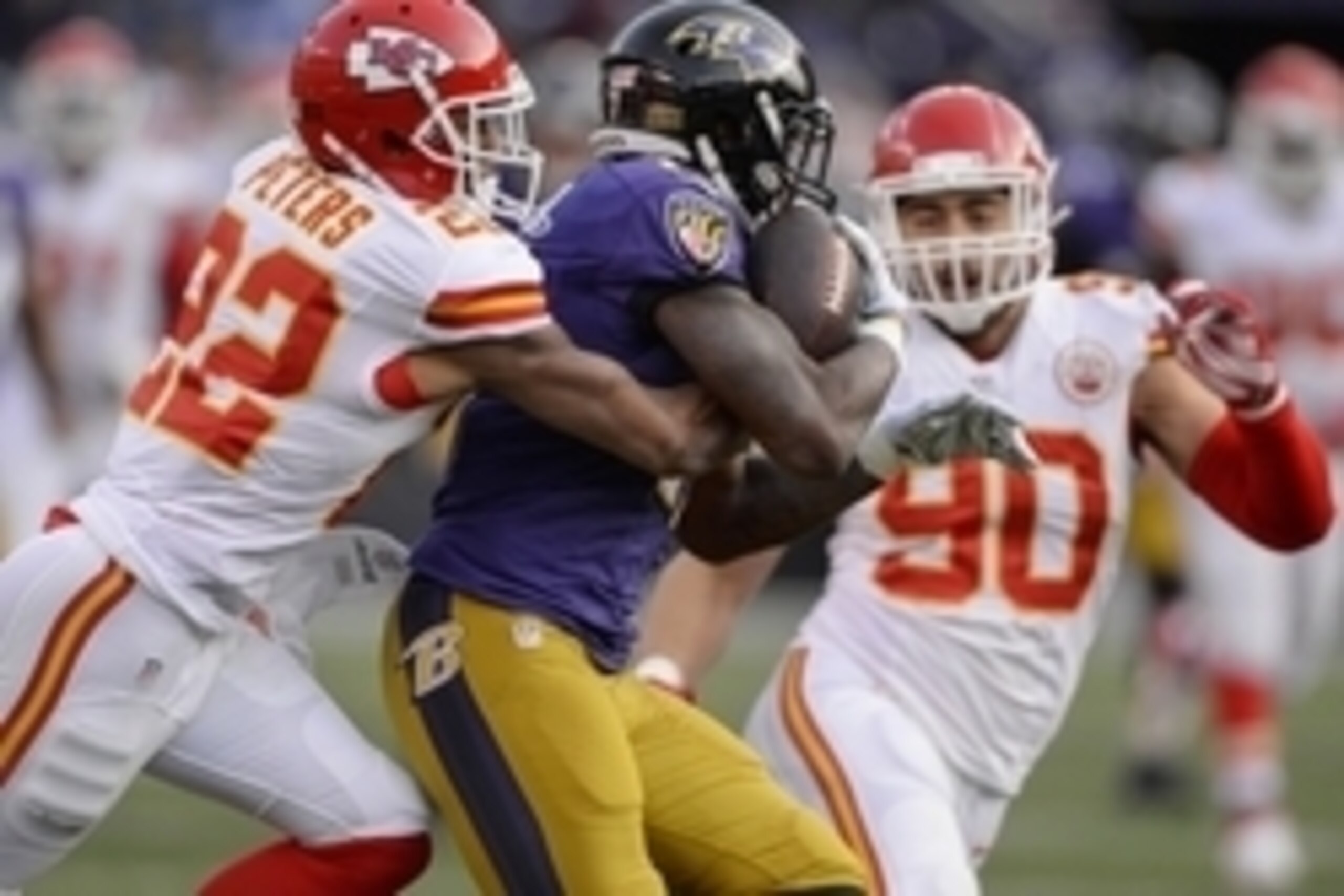 Dec 20, 2015; Baltimore, MD, USA; Kansas City Chiefs cornerback Marcus Peters (22) tackles Baltimore Ravens wide receiver Jeremy Butler (17) during the third quarter at M&T Bank Stadium. The Chiefs won 34-14. Mandatory Credit: Tommy Gilligan-USA TODAY Spo