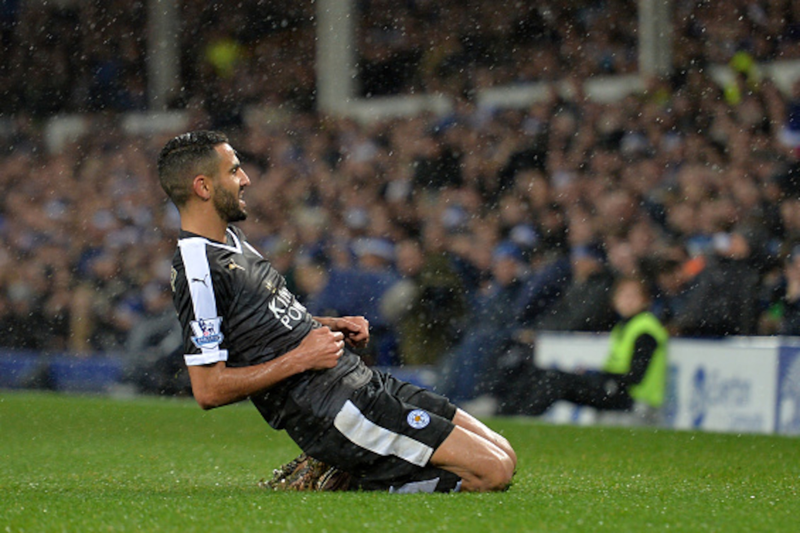 Leicester City's Algerian midfielder Riyad Mahrez celebrates after scoring their second goal during the English Premier League football match between Everton and Leicester City at Goodison Park in Liverpool, north west England on December 19, 2015. AFP PH