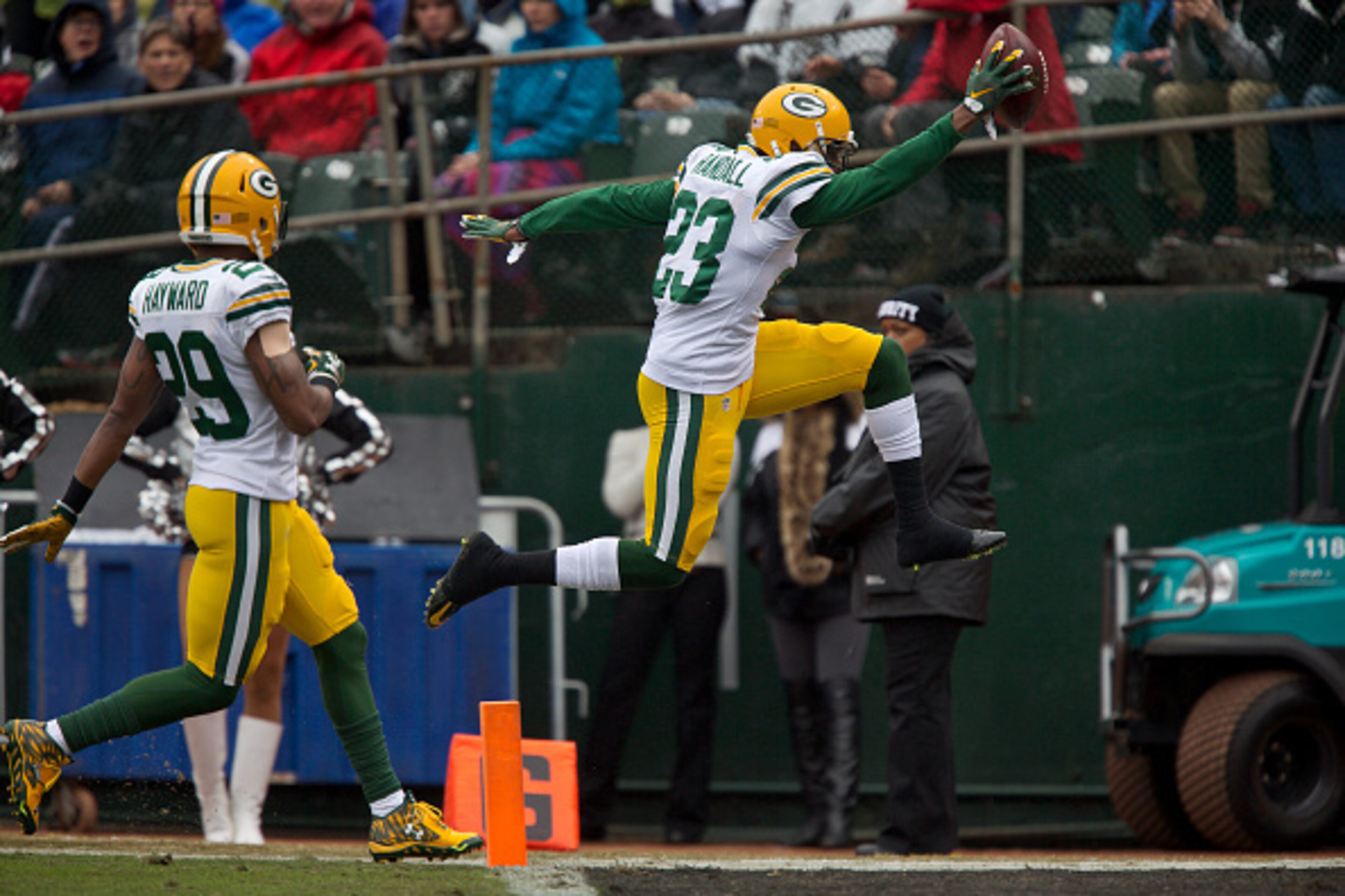 OAKLAND, CA - DECEMBER 20: Cornerback Damarious Randall #23 of the Green Bay Packers leaps into the endzone to punctuate a 43-yard touchdown on an interception against the Oakland Raiders in the second quarter on December 20, 2015 at O.co Coliseum in Oakl OAKLAND, CA - DECEMBER 20: Cornerback Damarious Randall #23 of the Green Bay Packers leaps into the endzone to punctuate a 43-yard touchdown on an interception against the Oakland Raiders in the second quarter on December 20, 2015 at O.co Coliseum in Oakl