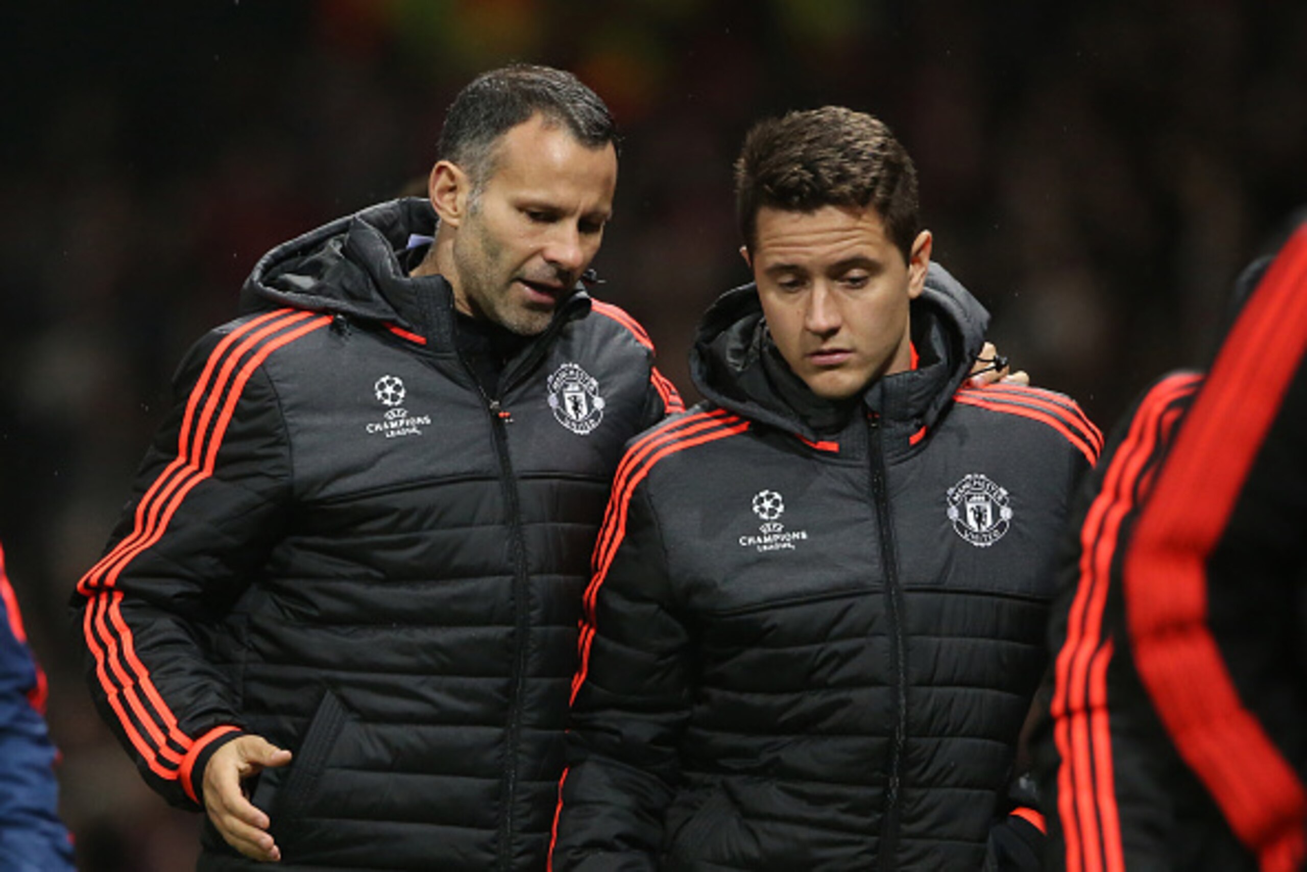 MANCHESTER, UNITED KINGDOM - NOVEMBER 03:  Ryan Giggs the assistant manager walks off with Ander Herrera of Manchester United at half time during the UEFA Champions League match on November 3, 2015 in Manchester, United Kingdom.  (Photo by Matthew Ashton 