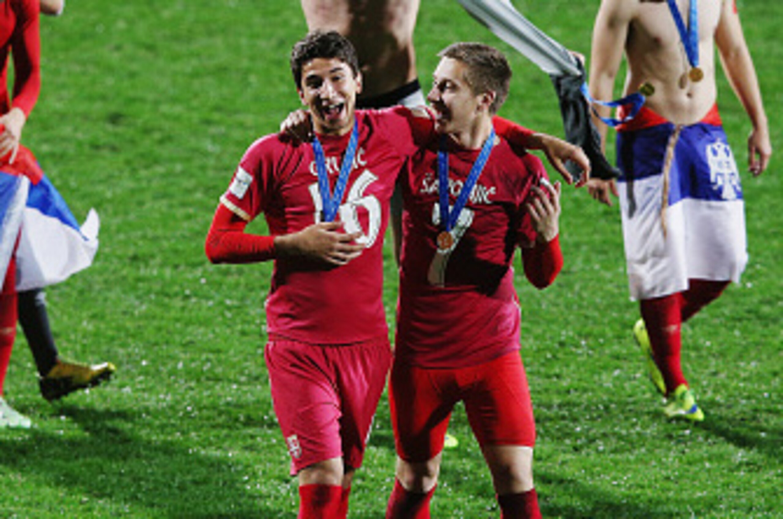 AUCKLAND, NEW ZEALAND - JUNE 20:  Marko Grujic of Serbia and Ivan Saponjic of Serbia celebrate after winning the FIFA U-20 World Cup Final match between Brazil and Serbia at North Harbour Stadium on June 20, 2015 in Auckland, New Zealand.  (Photo by Hanna