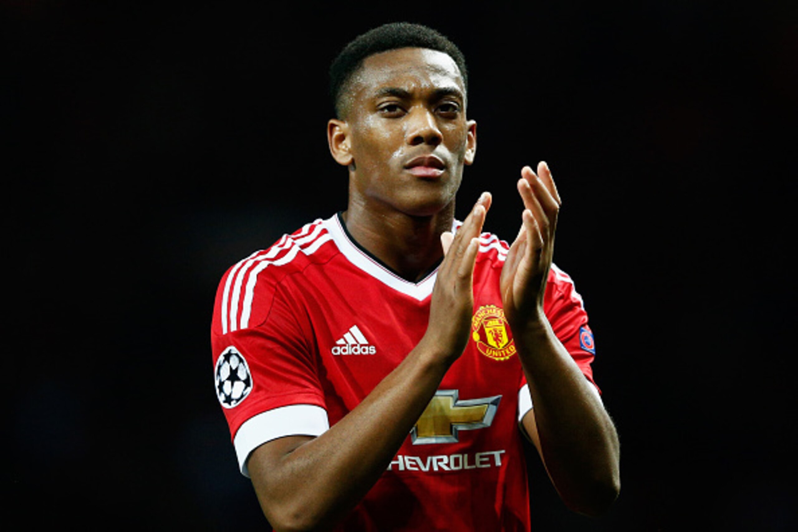 MANCHESTER, ENGLAND - SEPTEMBER 30:  Anthony Martial of Manchester United applauds the crowd after victory in the UEFA Champions League Group B match between Manchester United FC and VfL Wolfsburg at Old Trafford on September 30, 2015 in Manchester, Unite