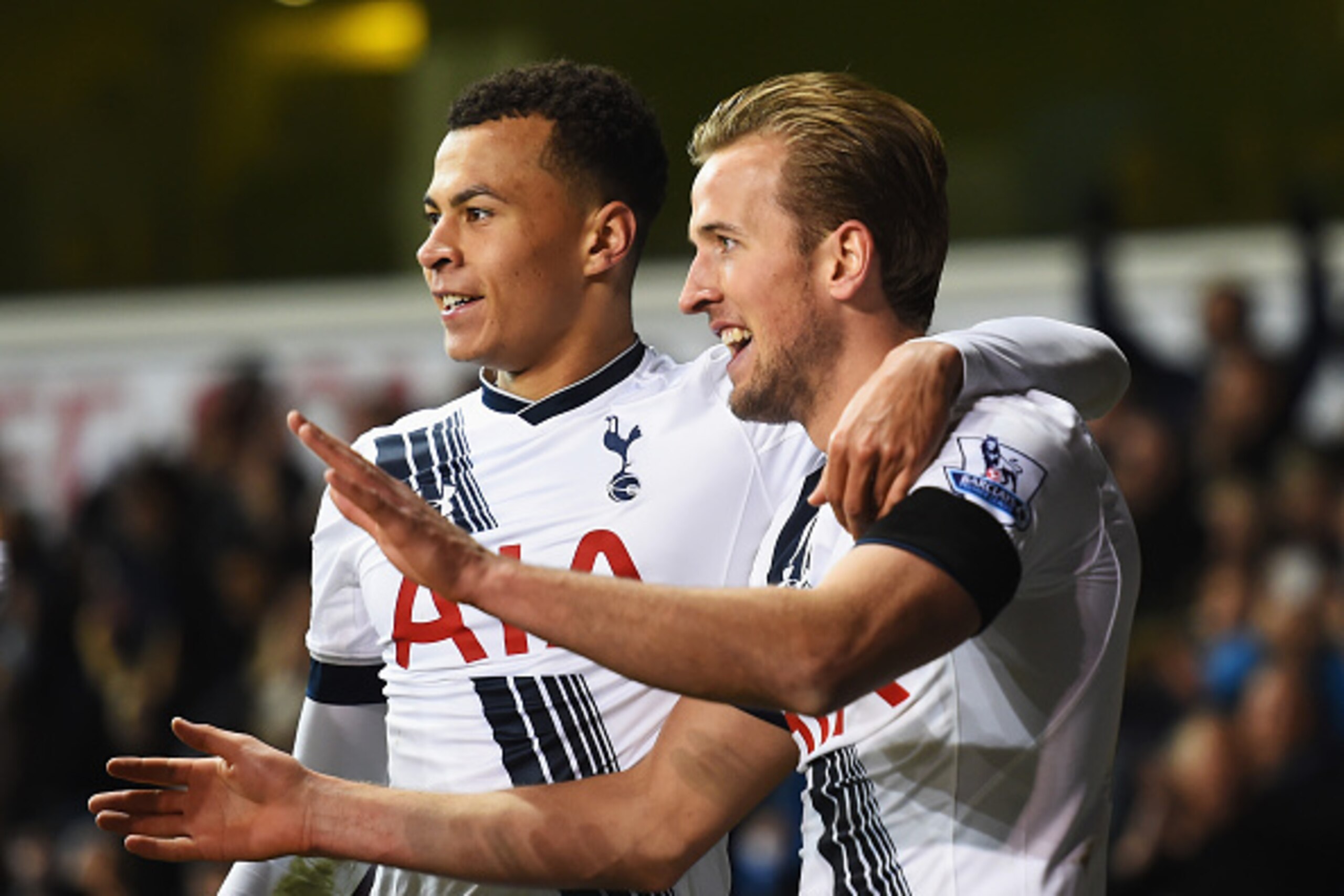 LONDON, ENGLAND - NOVEMBER 22:  Harry Kane (R) of Tottenham Hotspur celebrates scoring his teams third goal with Dele Alli of Tottenham Hotspur during the Barclays Premier League match between Tottenham Hotspur and West Ham United at White Hart Lane on No