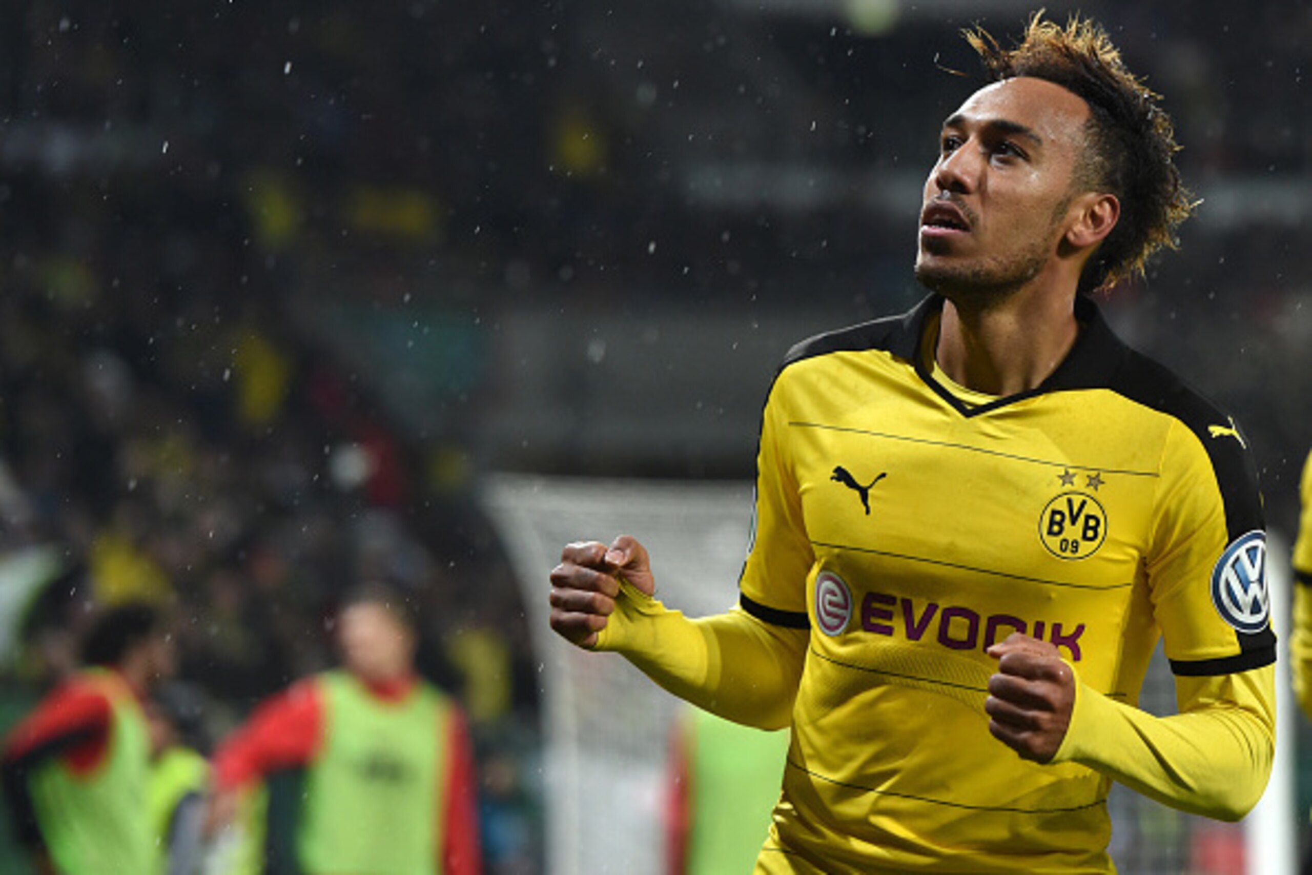 Dortmund's Gabonese striker Pierre-Emerick Aubameyang celebrates after his goal during the German Cup DFB Pokal third round match between Borussia Dortmund and FC Augsburg in Augsburg on December 16, 2015. / AFP / Christof STACHE / RESTRICTIONS: ACCORDIN Dortmund's Gabonese striker Pierre-Emerick Aubameyang celebrates after his goal during the German Cup DFB Pokal third round match between Borussia Dortmund and FC Augsburg in Augsburg on December 16, 2015. / AFP / Christof STACHE / RESTRICTIONS: ACCORDIN