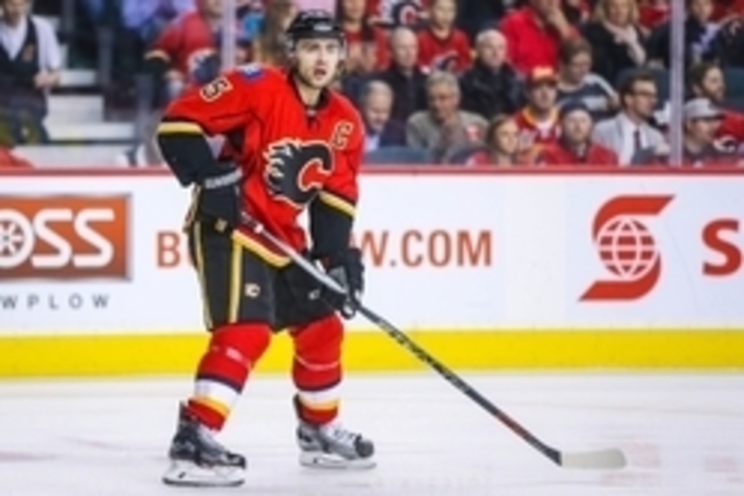 Dec 8, 2015; Calgary, Alberta, CAN; Calgary Flames defenseman Mark Giordano (5) skates against the San Jose Sharks during the first period at Scotiabank Saddledome. Calgary Flames won 4-2. Mandatory Credit: Sergei Belski-USA TODAY Sports