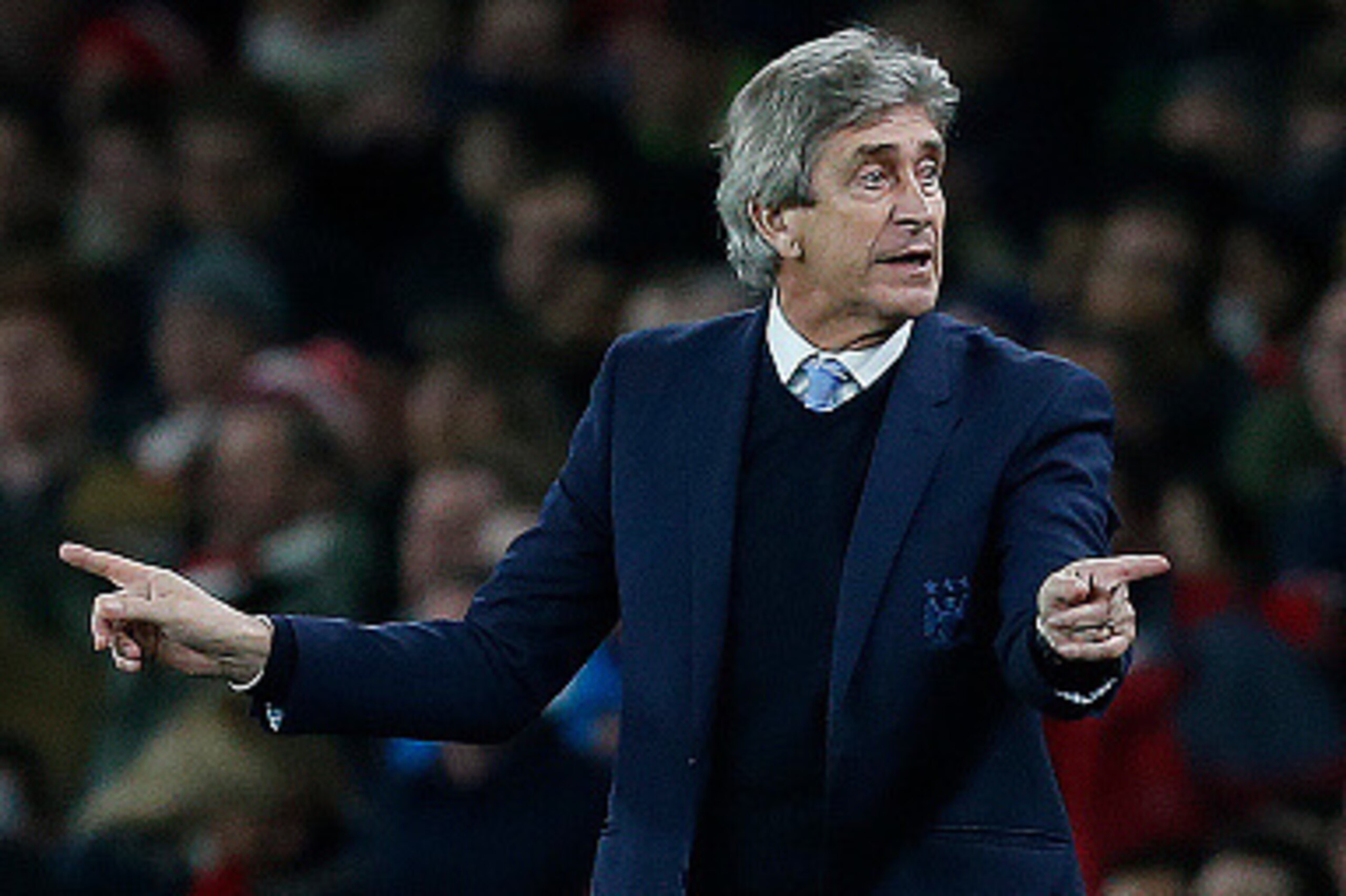 Manchester City's Chilean manager Manuel Pellegrini gestures during the English Premier League football match between Arsenal and Manchester City at the Emirates Stadium in London on December 21, 2015. AFP PHOTO / IKIMAGES

RESTRICTED TO EDITORIAL USE. No