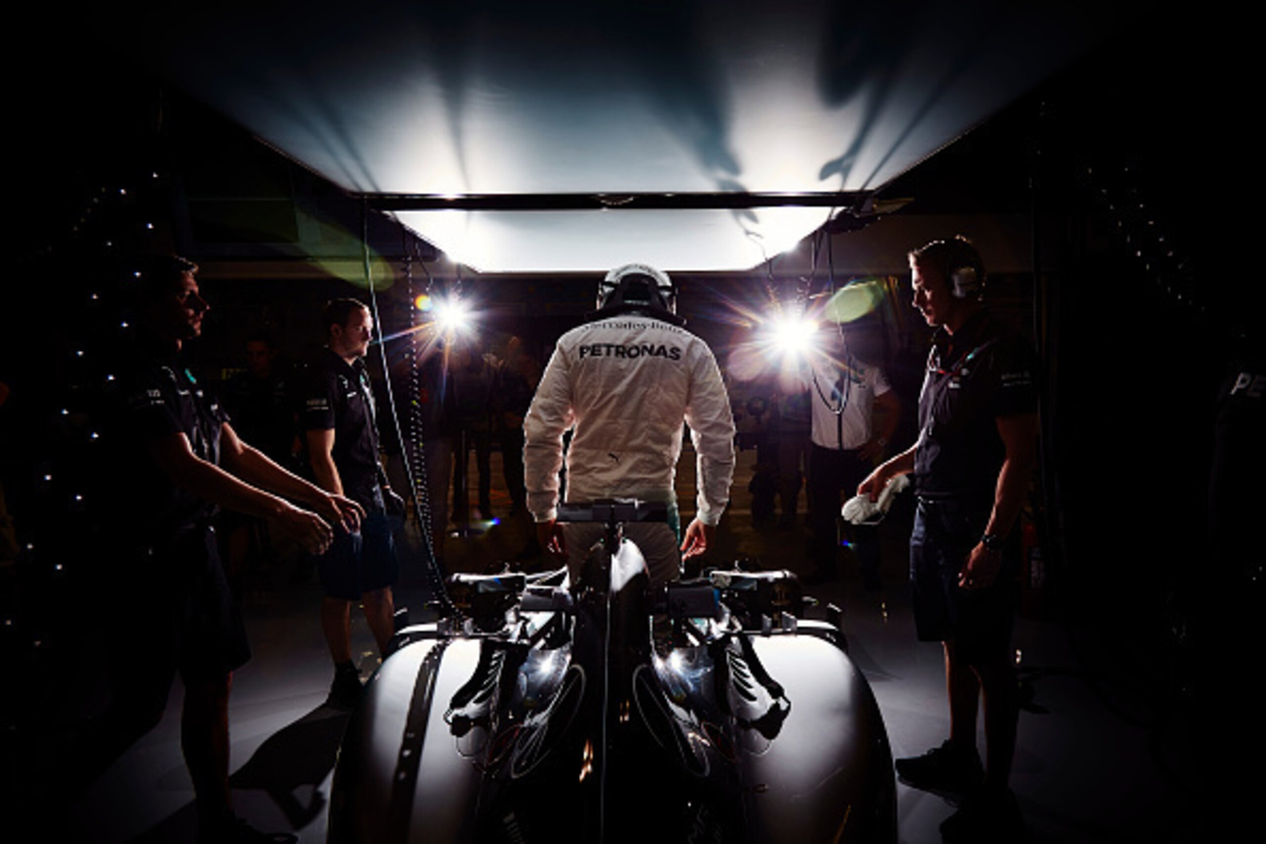 BAHRAIN, BAHRAIN - APRIL 17:  Lewis Hamilton of Great Britain and Mercedes GP climbs out of his car  during practice for the Bahrain Formula One Grand Prix at Bahrain International Circuit on April 17, 2015 in Bahrain, Bahrain.  (Photo by Steve Etheringto