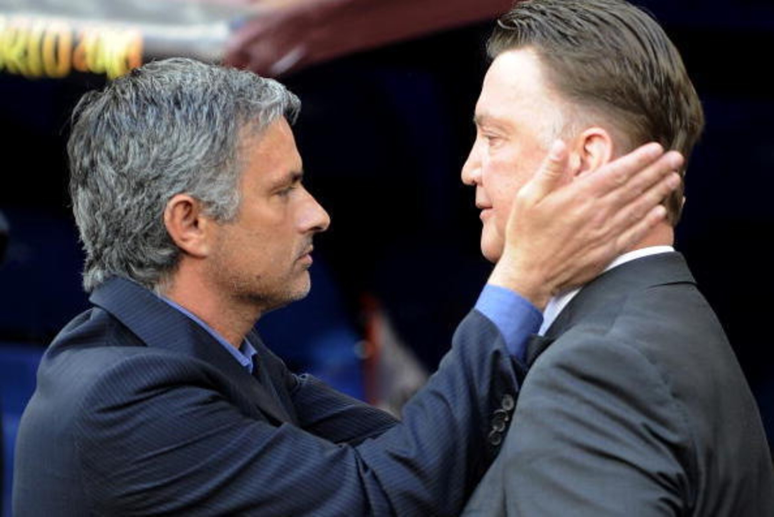 Bayern Munich's Dutch head coach Louis van Gaal (R) and Inter Milan's Portuguese  coach Jose Mourinho greet each other before the UEFA Champions League final football match Inter Milan against Bayern Munich at the Santiago Bernabeu stadium in Madrid on Ma