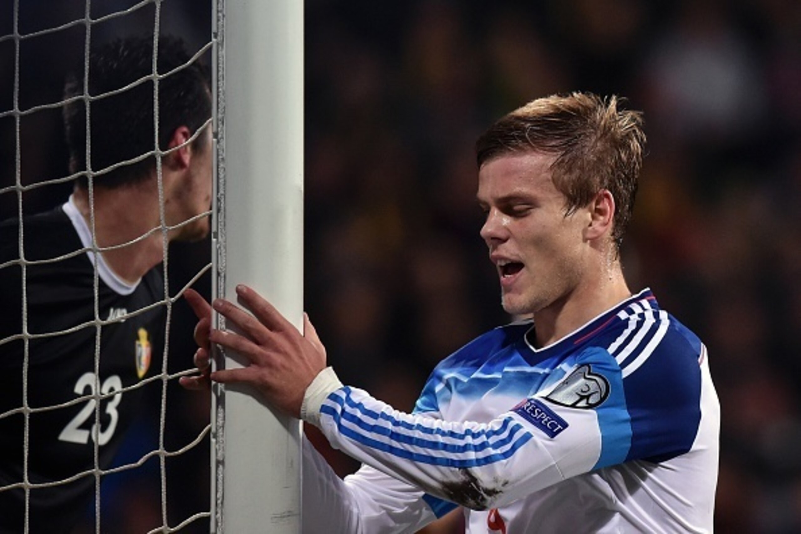 Russia's Aleksandr Kokorin (R) reacts during the UEFA Euro 2016 qualifying football match between Russia and Moldova in Chisinau on October 9, 2015. AFP PHOTO / KIRILL KUDRYAVTSEV        (Photo credit should read KIRILL KUDRYAVTSEV/AFP/Getty Images)