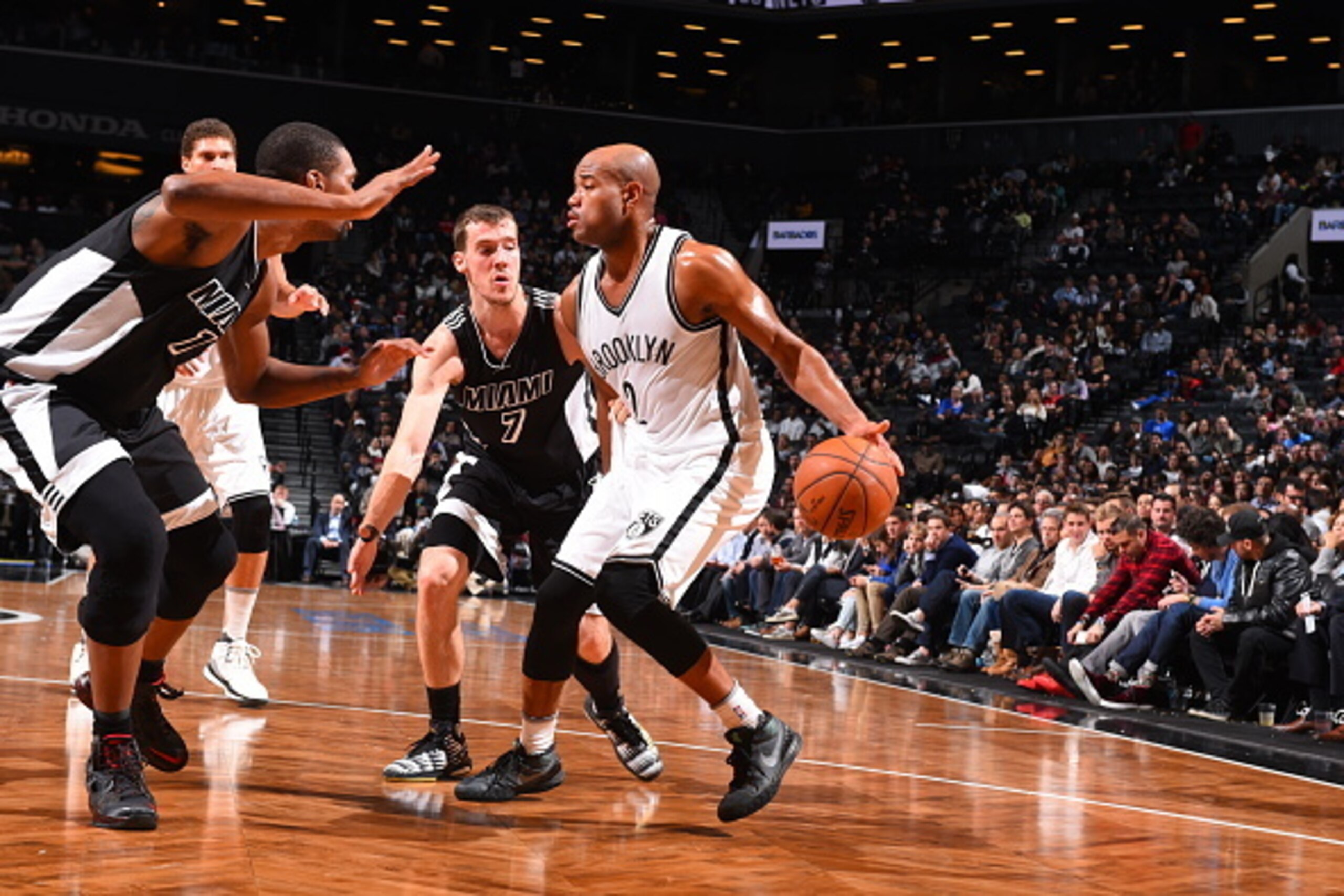 BROOKLYN, NY - DECEMBER 16:  Jarrett Jack #2 of the Brooklyn Nets dribbles the ball in traffic against the Miami Heat on December 16, 2015 at Barclays Center in Brooklyn, New York. NOTE TO USER: User expressly acknowledges and agrees that, by downloading 