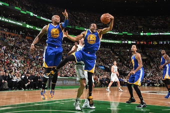 BOSTON, MA - DECEMBER 11:  Andre Iguodala #9 of the Golden State Warriors grabs the rebound against the Boston Celtics on December 11, 2015 at the TD Garden in Boston, Massachusetts.  NOTE TO USER: User expressly acknowledges and agrees that, by downloadi