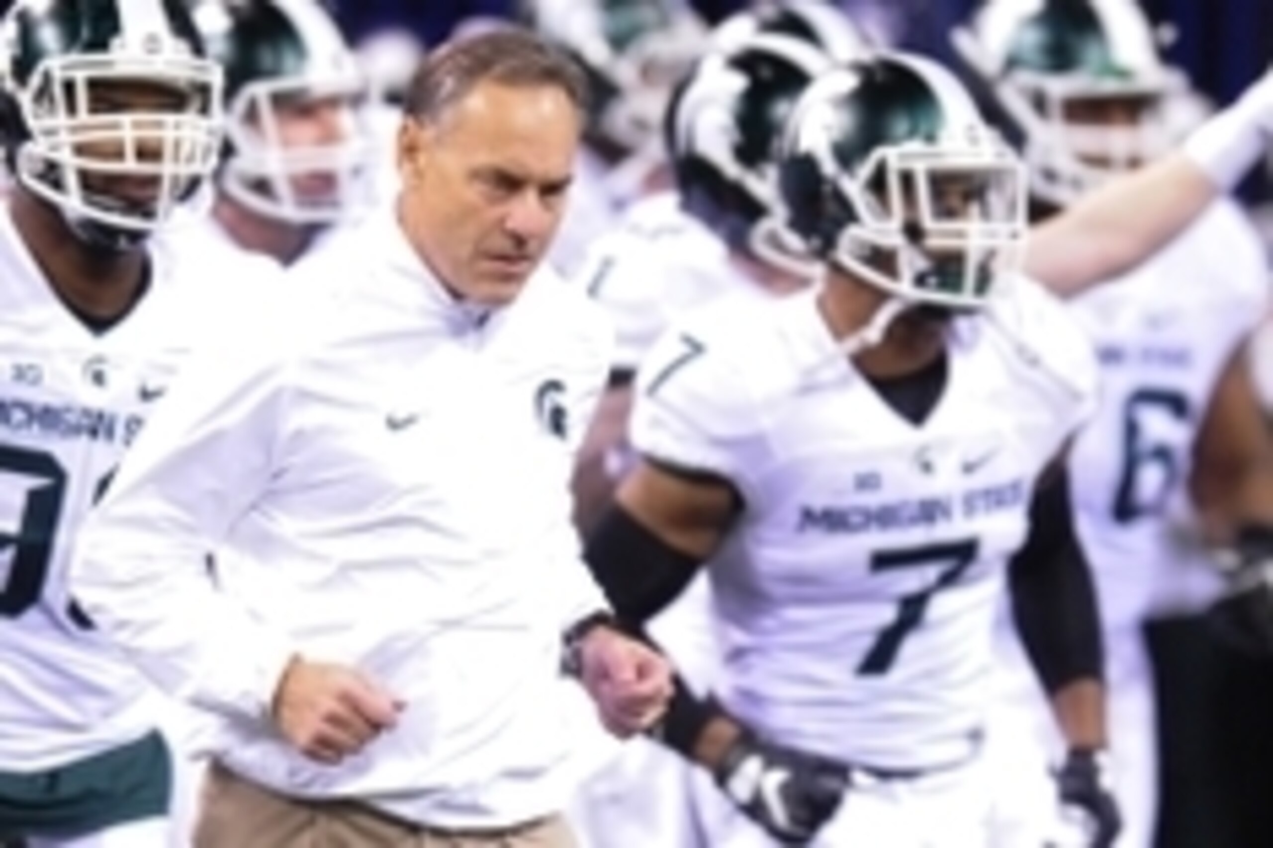 Dec 5, 2015; Indianapolis, IN, USA; Michigan State Spartans head coach Mark Dantonio leads his team onto the field for the game against the Iowa Hawkeyes in the Big Ten Conference football championship at Lucas Oil Stadium. Mandatory Credit: Thomas J. Rus Dec 5, 2015; Indianapolis, IN, USA; Michigan State Spartans head coach Mark Dantonio leads his team onto the field for the game against the Iowa Hawkeyes in the Big Ten Conference football championship at Lucas Oil Stadium. Mandatory Credit: Thomas J. Rus