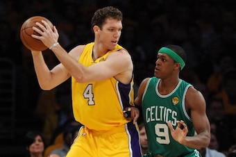 LOS ANGELES, CA - JUNE 03:  Luke Walton #4 of the Los Angeles Lakers looks to pass against Rajon Rondo #9 of the Boston Celtics in Game One of the 2010 NBA Finals at Staples Center on June 3, 2010 in Los Angeles, California.  NOTE TO USER: User expressly 