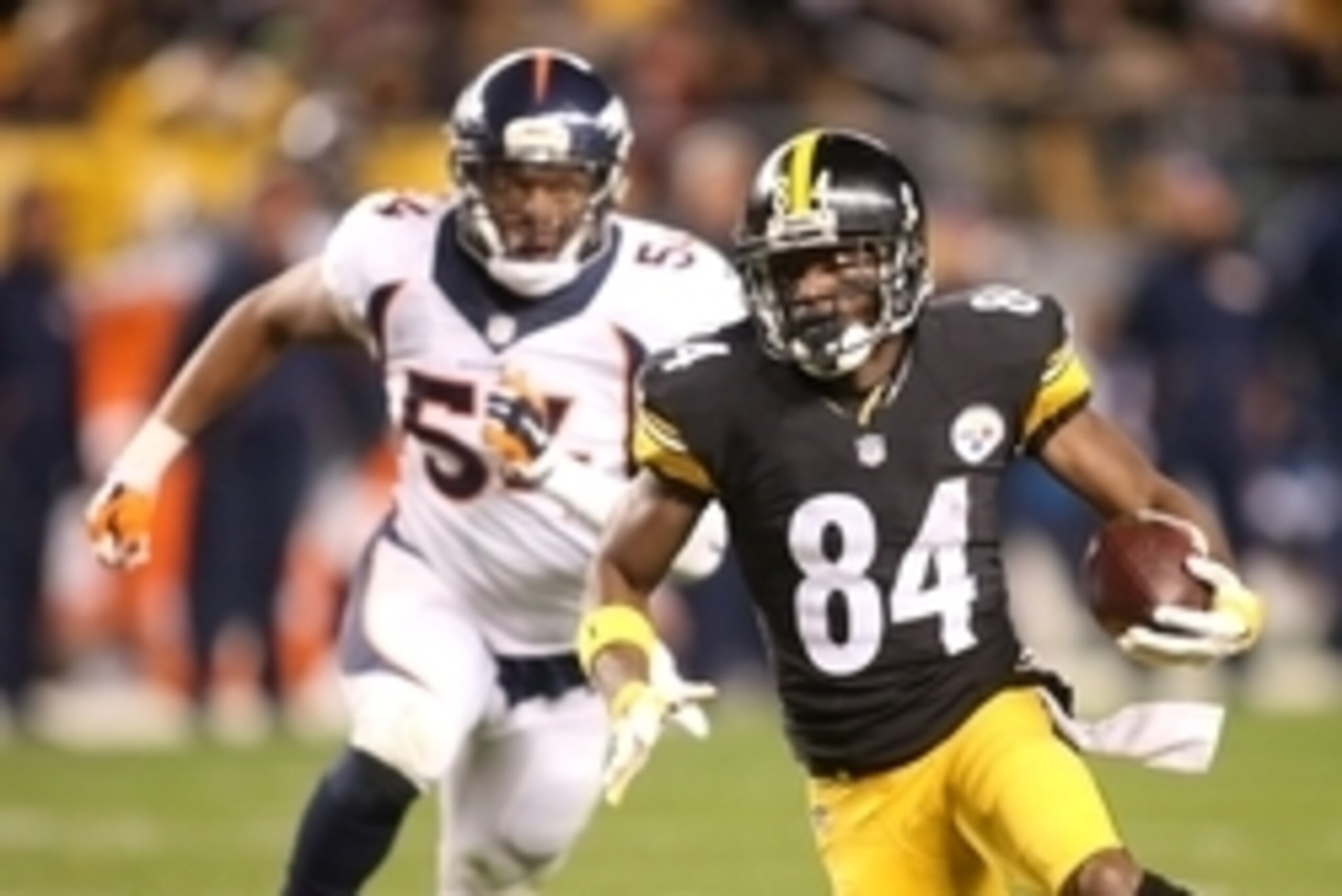 Dec 20, 2015; Pittsburgh, PA, USA; Pittsburgh Steelers wide receiver Antonio Brown (84) runs after a catch ahead of Denver Broncos inside linebacker Brandon Marshall (54) during the second quarter at Heinz Field. Mandatory Credit: Charles LeClaire-USA TOD