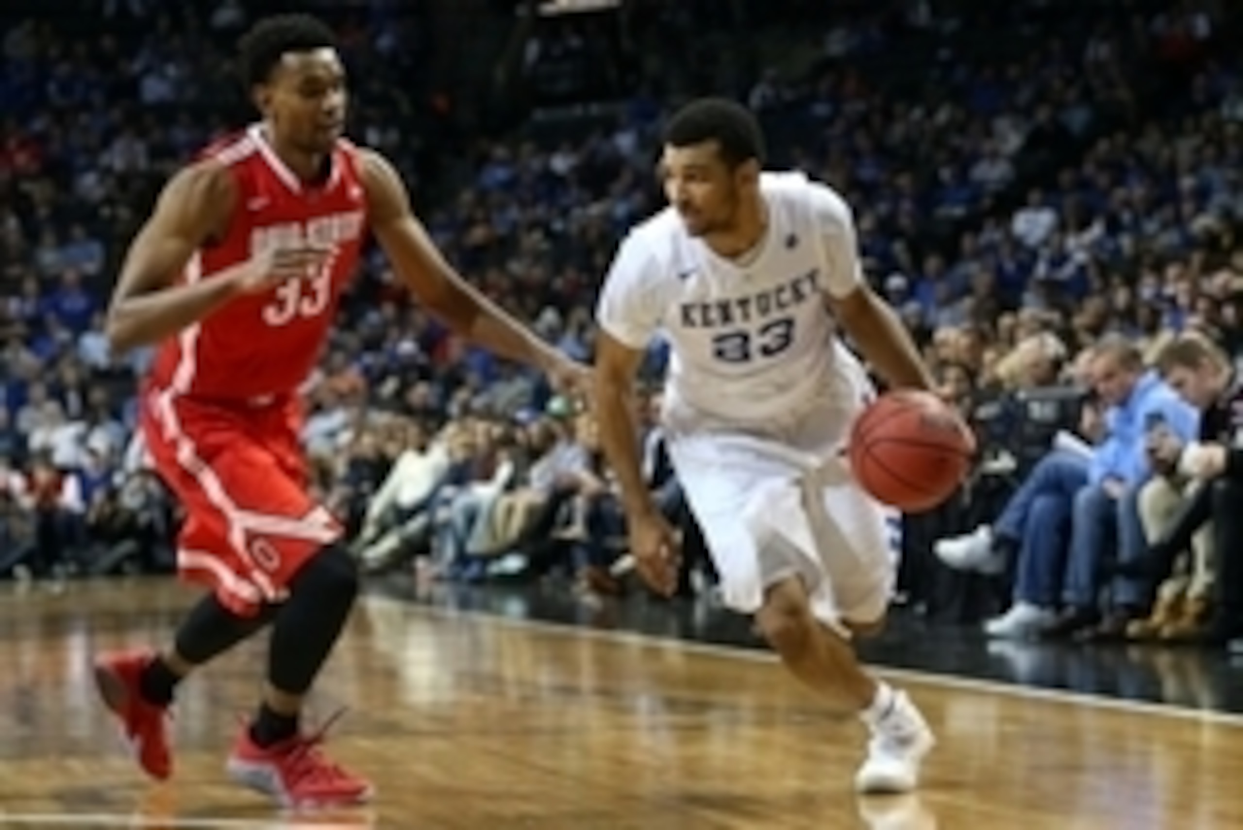 Dec 19, 2015; Brooklyn, NY, USA; Kentucky Wildcats guard Jamal Murray (23) drives around Ohio State Buckeyes forward Keita Bates-Diop (33) during the second half at Barclays Center. Ohio State Buckeyes won 74-67. Mandatory Credit: Anthony Gruppuso-USA TOD