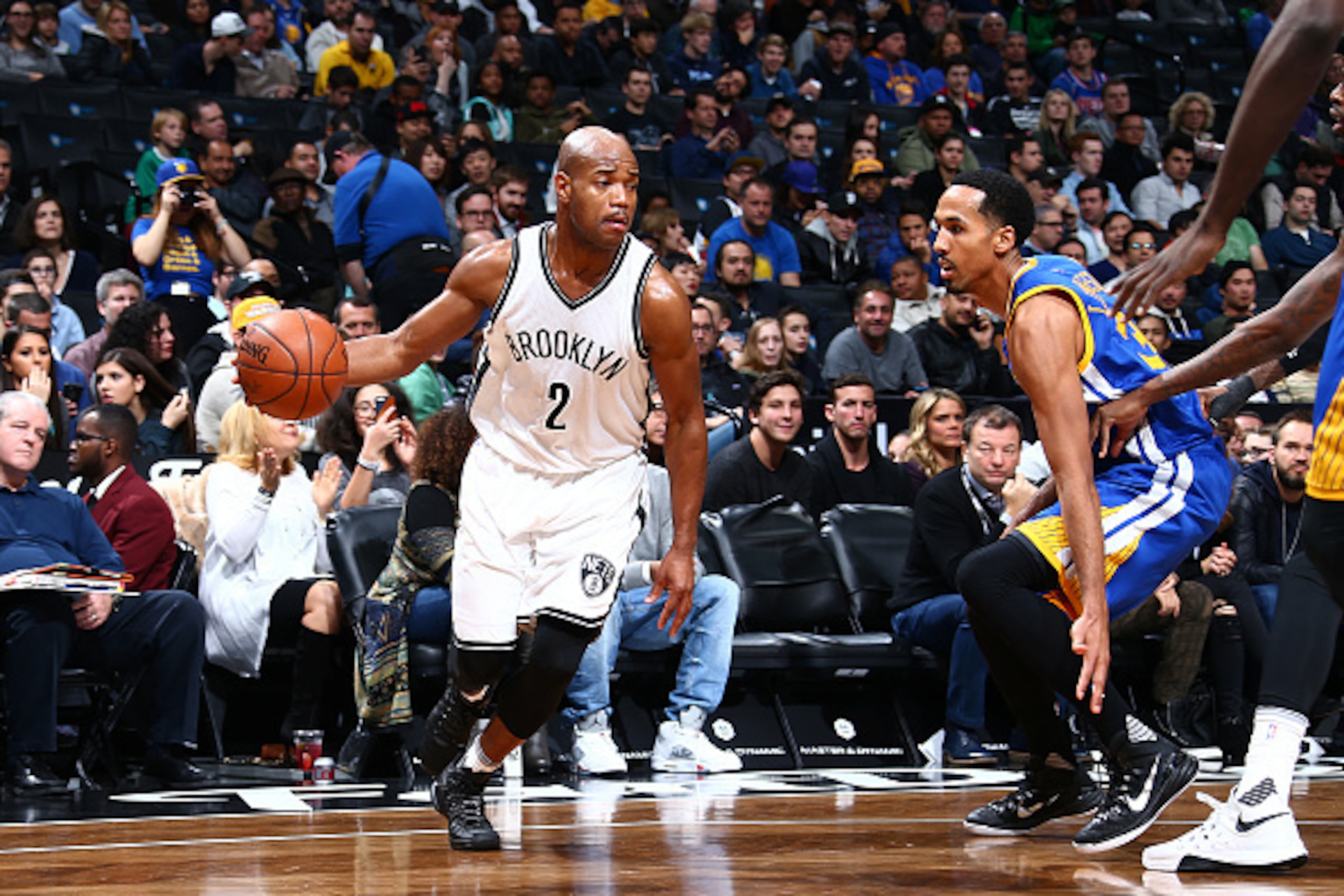 BROOKLYN, NY - DECEMBER 6: Jarrett Jack #2 of the Brooklyn Nets handles the ball during the game against the Golden State Warriors on December 6, 2015 at Barclays Center in Brooklyn, New York. NOTE TO USER: User expressly acknowledges and agrees that, by 