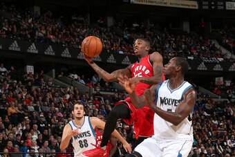 OTTAWA, ON - OCTOBER 14:  Delon Wright #55 of the Toronto Raptors drives to the basket against the Minnesota Timberwolves during a preseaon game at Canadian Tire Centre on October 14, 2015 in Ottawa, Ontario, Canada. NOTE TO USER: User expressly acknowled