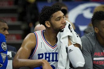 PHILADELPHIA, PA - DECEMBER 7: Jahlil Okafor #8 of the Philadelphia 76ers watches the game against the San Antonio Spurs from the bench on December 7, 2015 at the Wells Fargo Center in Philadelphia, Pennsylvania. NOTE TO USER: User expressly acknowledges 
