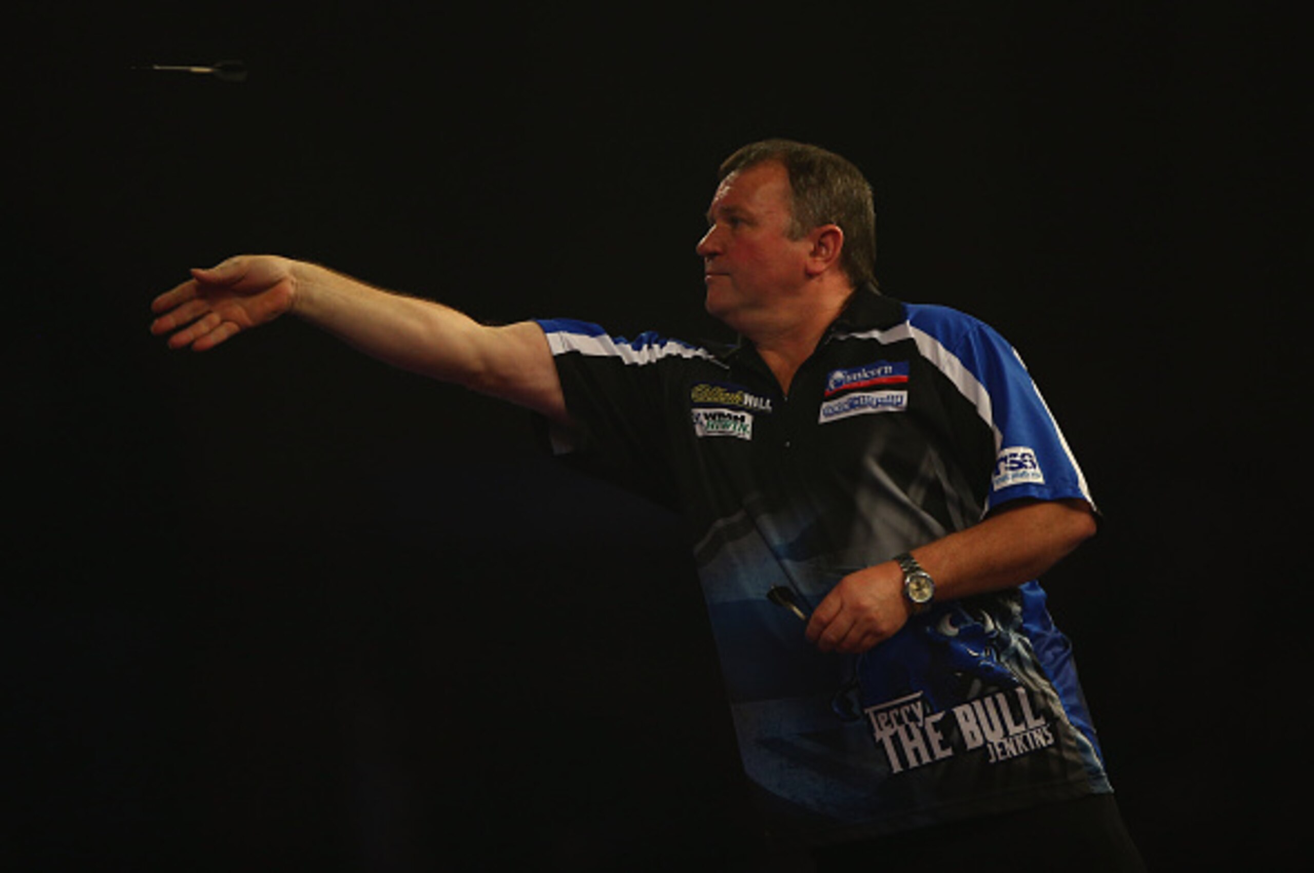 LONDON, ENGLAND - DECEMBER 22:  Darin Young in action during his match against Terry Jenkins during the 2016 William Hill PDC World Darts Championships on Day Five at Alexandra Palace on December 22, 2015 in London, England.  (Photo by Ian Walton/Getty Im