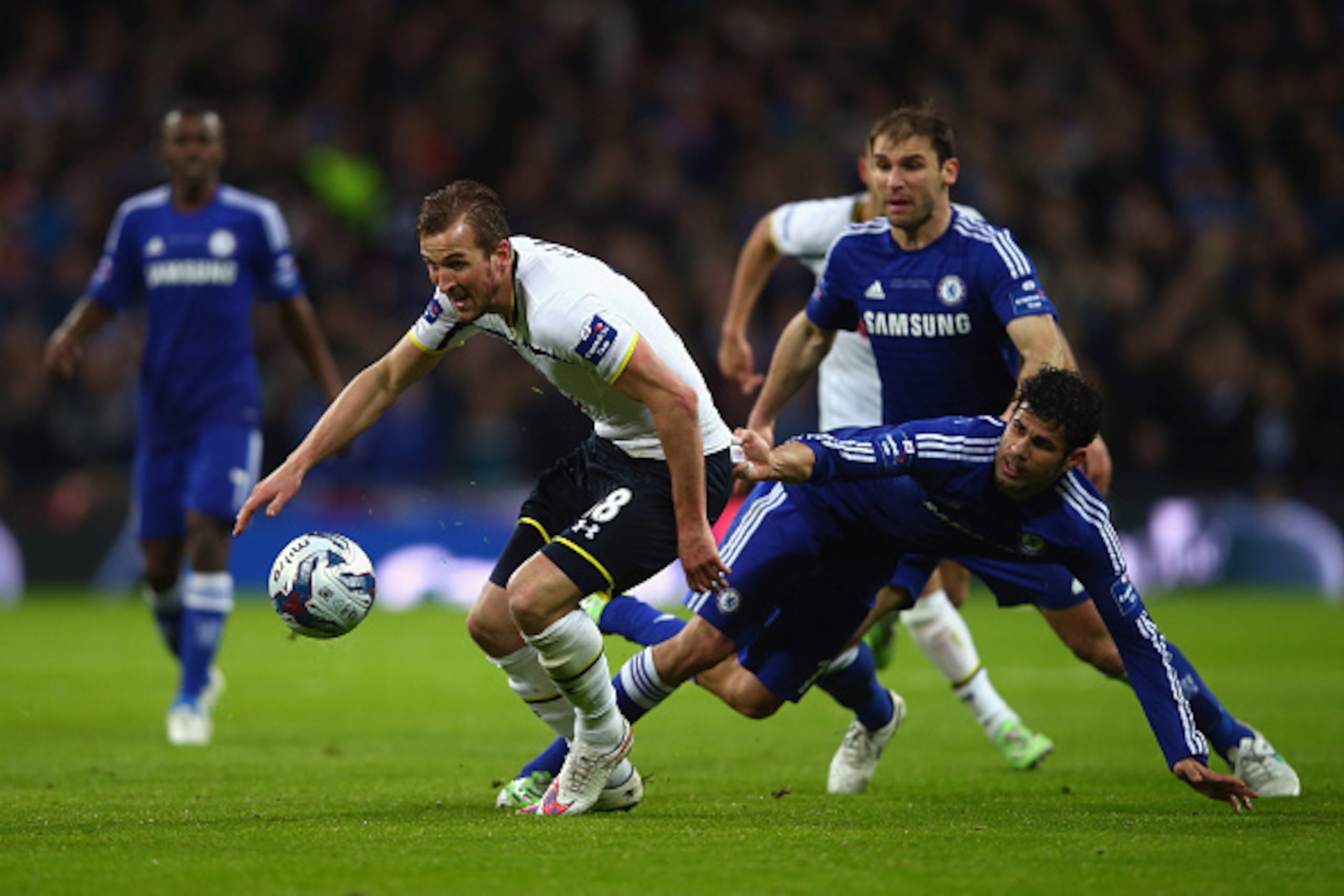 LONDON, ENGLAND - MARCH 01:  Diego Costa of Chelsea pulls on the shirt of Harry Kane of Spurs during the Capital One Cup Final match between Chelsea and Tottenham Hotspur at Wembley Stadium on March 1, 2015 in London, England.  (Photo by Clive Rose/Getty 