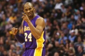 Dec 22, 2015; Denver, CO, USA; Los Angeles Lakers forward Kobe Bryant (24) reacts during the second half against the Denver Nuggets at Pepsi Center.  The Lakers won 111-107. Mandatory Credit: Chris Humphreys-USA TODAY Sports