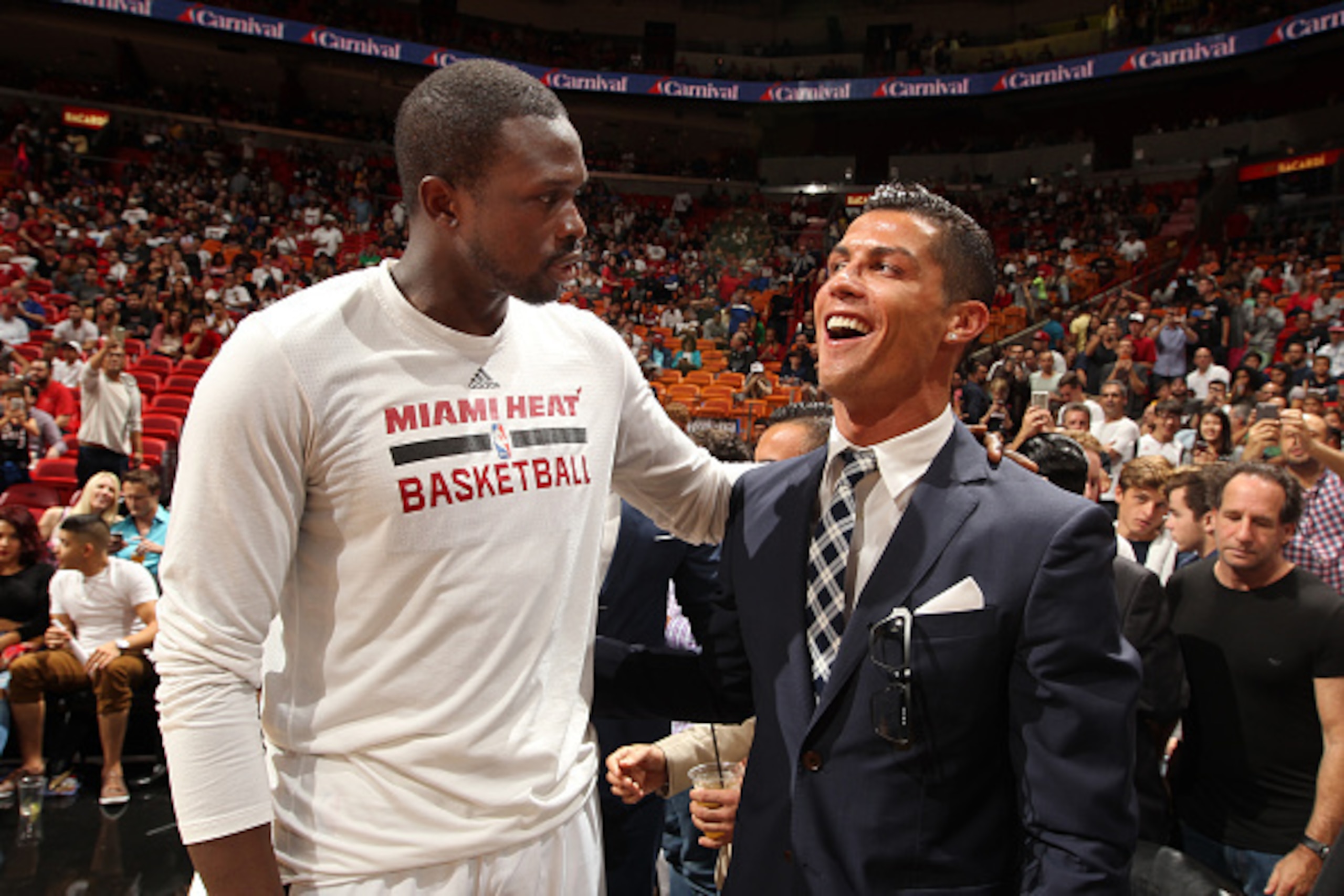 MIAMI, FL - DECEMBER 22: Luol Deng #9 of the Miami Heat poses with professional soccer player Cristiano Ronaldo during the game against the Detroit Pistons on December 22, 2015 at American Airlines Arena in Miami, Florida. NOTE TO USER: User expressly ack