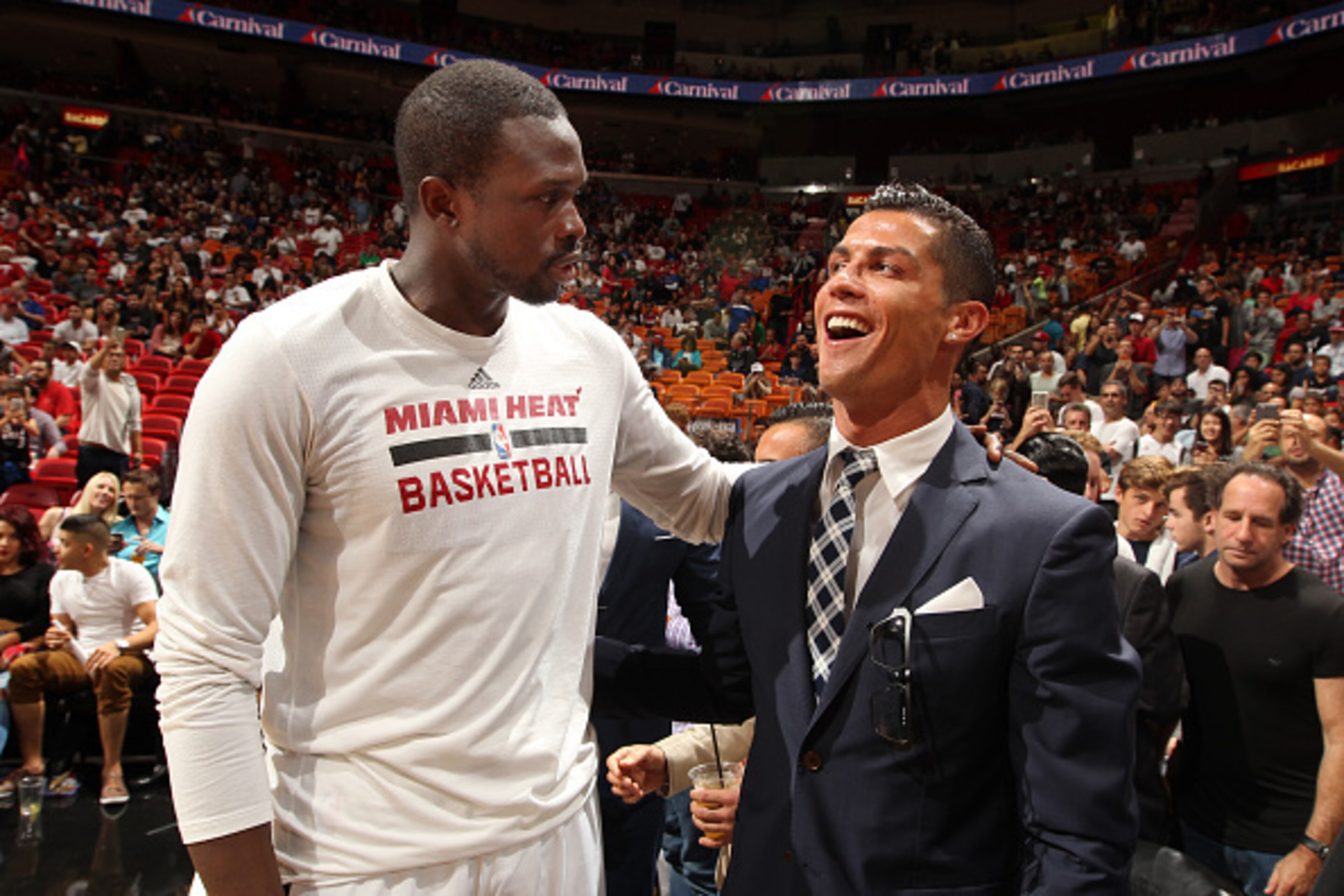 MIAMI, FL - DECEMBER 22: Luol Deng #9 of the Miami Heat poses with professional soccer player Cristiano Ronaldo during the game against the Detroit Pistons on December 22, 2015 at American Airlines Arena in Miami, Florida. NOTE TO USER: User expressly ack