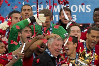 Sir Alex celebrates his final league title.