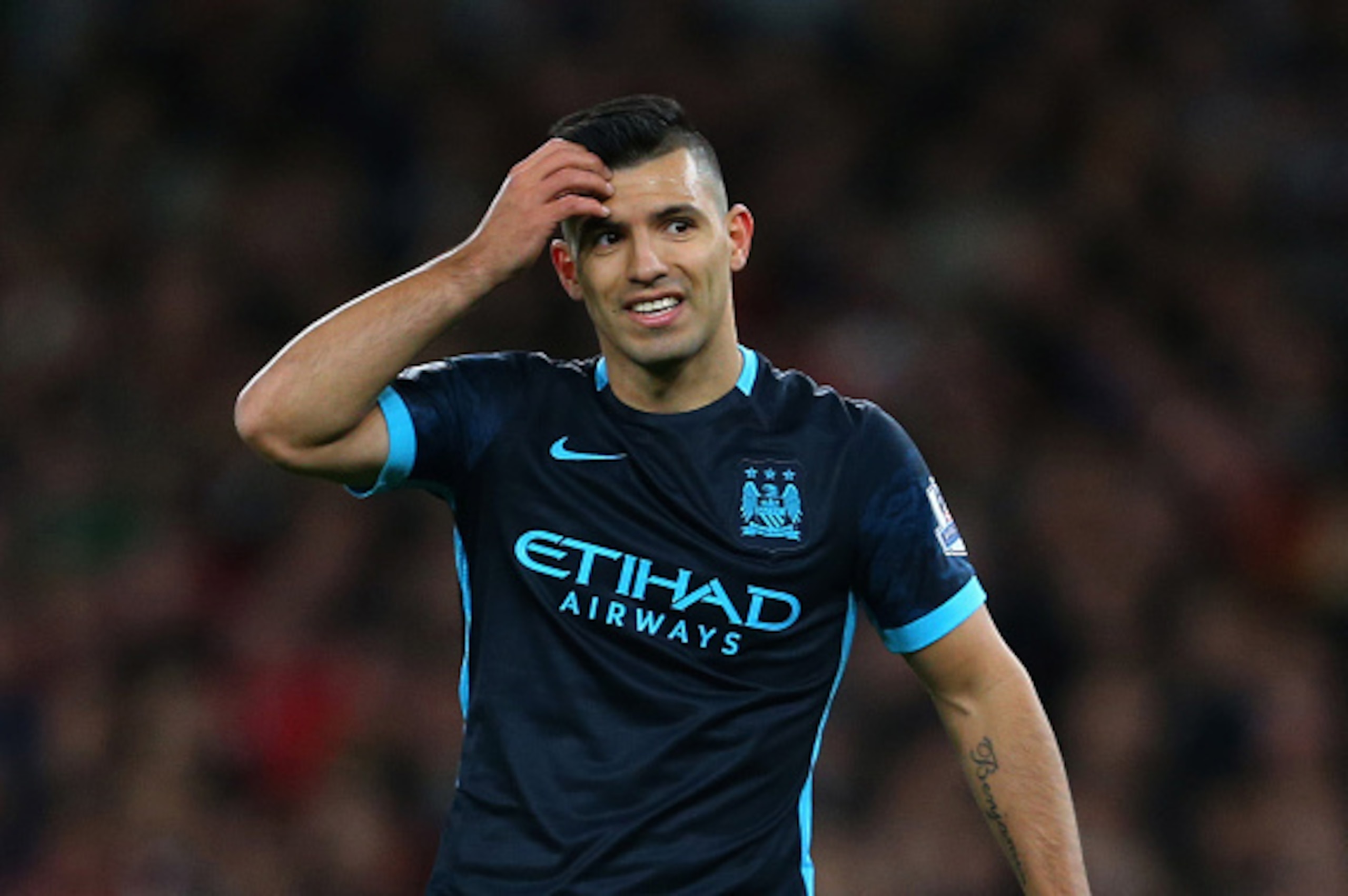 LONDON, ENGLAND - DECEMBER 21:  Sergio Aguero of Manchester City reacts after missing a chance during the Barclays Premier League match between Arsenal and Manchester City at the Emirates Stadium on December 21, 2015 in London, England.  (Photo by Catheri