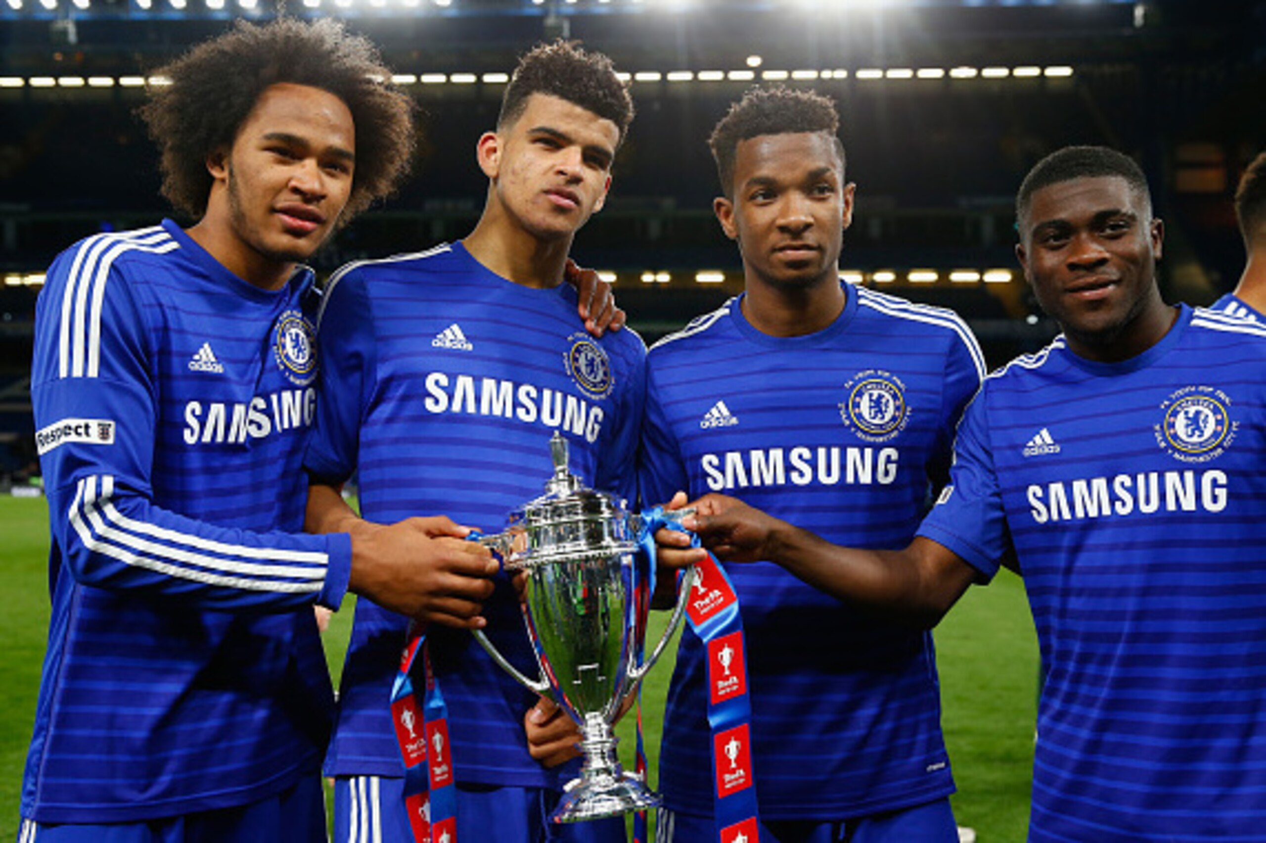 LONDON, ENGLAND - APRIL 27:  (L-R) Isaiah Brown, Dominic Solanke, Kasey Palmer and Jeremie Boga of Chelsea with the winners trophy during the FA Youth Cup Final second leg match between Chelsea and Manchester City at Stamford Bridge on April 27, 2015 in L