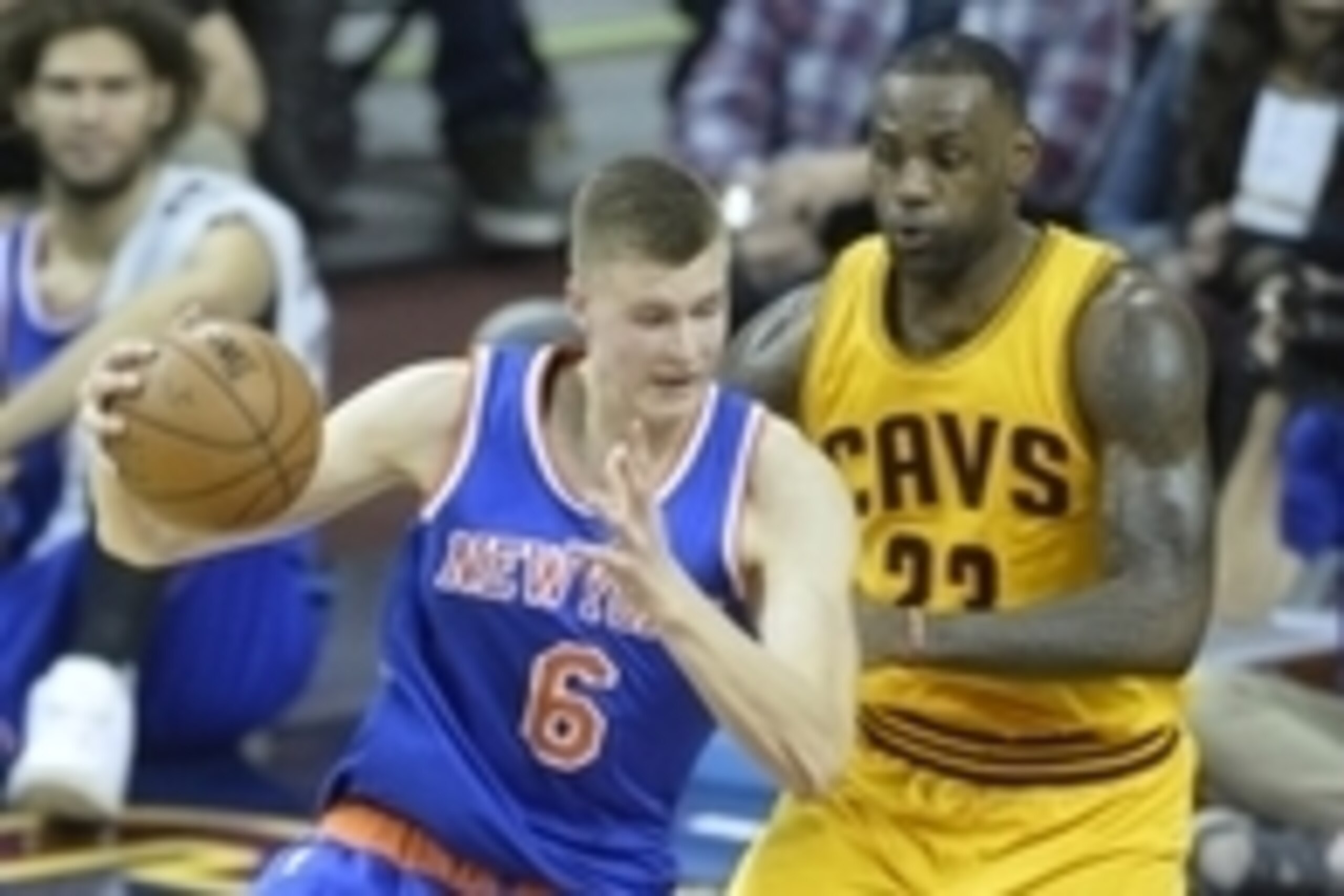 Dec 23, 2015; Cleveland, OH, USA; Cleveland Cavaliers forward LeBron James (23) defends New York Knicks forward Kristaps Porzingis (6) in the second quarter at Quicken Loans Arena. Mandatory Credit: David Richard-USA TODAY Sports