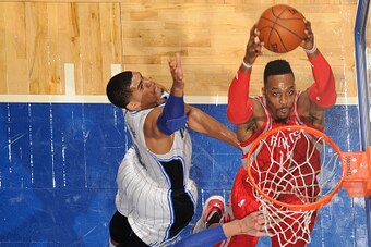 ORLANDO, FL - DECEMBER 23:  Dwight Howard #12 of the Houston Rockets goes up for a dunk against the Orlando Magic on December 23, 2015 at Amway Center in Orlando, Florida. NOTE TO USER: User expressly acknowledges and agrees that, by downloading and or us
