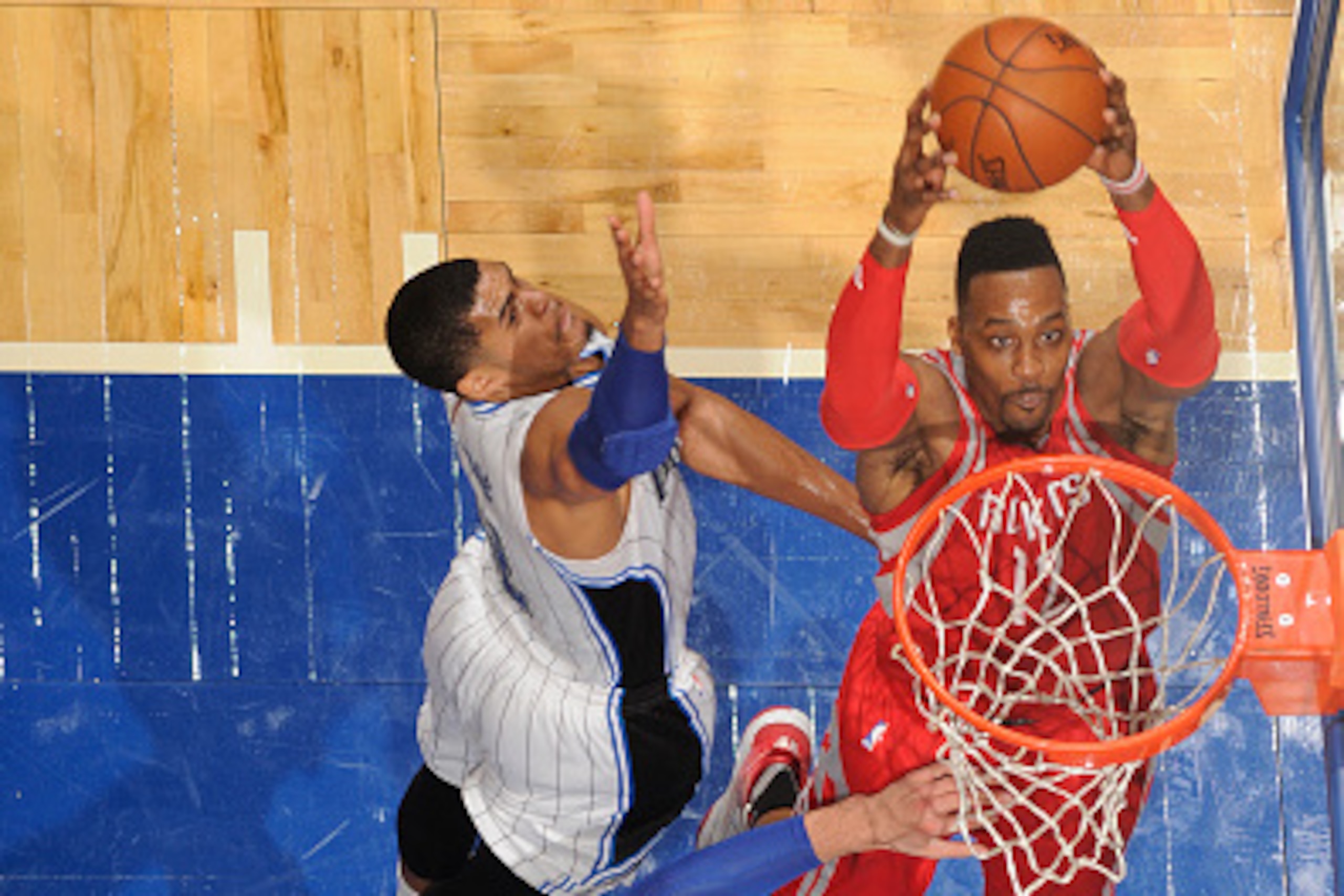 ORLANDO, FL - DECEMBER 23:  Dwight Howard #12 of the Houston Rockets goes up for a dunk against the Orlando Magic on December 23, 2015 at Amway Center in Orlando, Florida. NOTE TO USER: User expressly acknowledges and agrees that, by downloading and or us