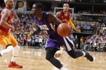 Dec 23, 2015; Indianapolis, IN, USA; Sacramento Kings guard Darren Collison (7) drives to the basket against Indiana Pacers guard George Hill (3) at Bankers Life Fieldhouse. Sacramento defeats Indiana 108-106. Mandatory Credit: Brian Spurlock-USA TODAY Sp