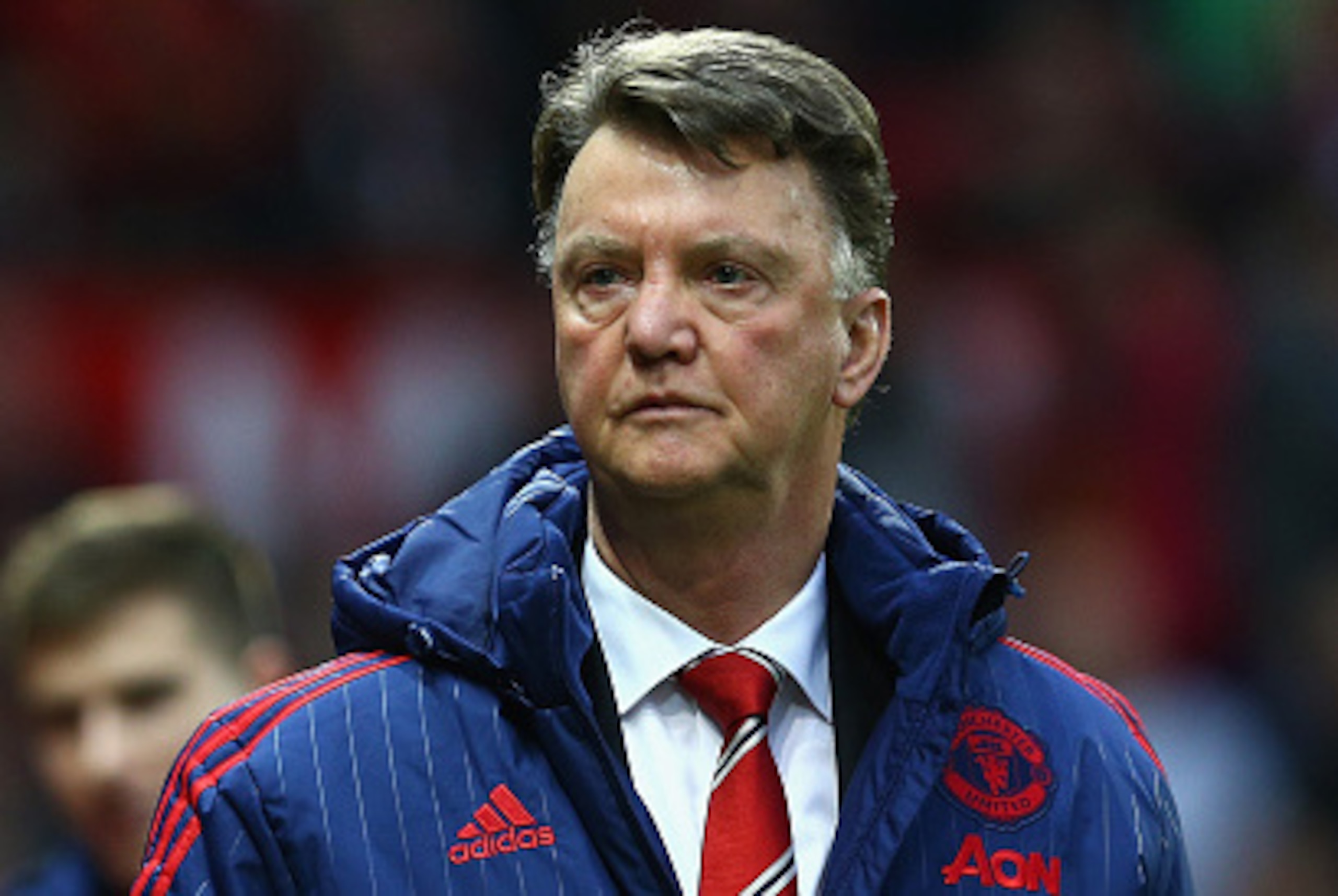 MANCHESTER, ENGLAND - DECEMBER 19:  Louis van Gaal Manager of Manchester United walks into the pitch prior to  the Barclays Premier League match between Manchester United and Norwich City at Old Trafford on December 19, 2015 in Manchester, England.  (Phot