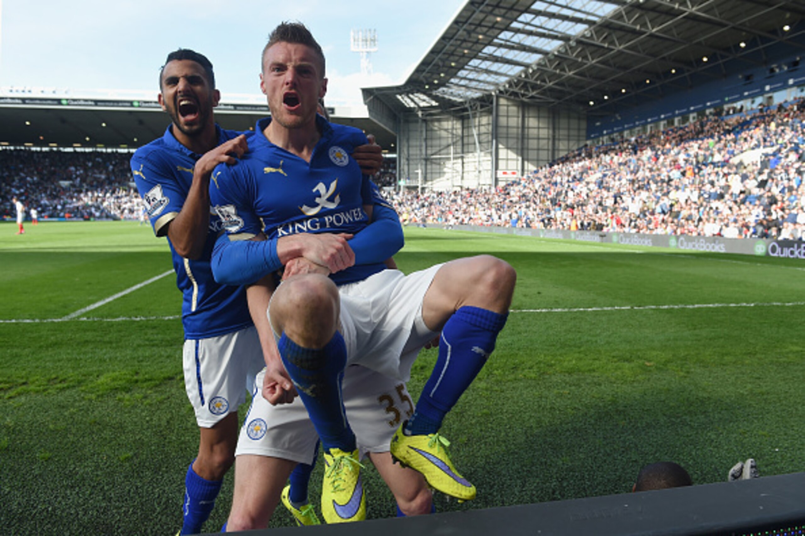 WEST BROMWICH, ENGLAND - APRIL 11:  Jamie Vardy of Leicester City (R) with Riyad Mahrez of Leicester City (L) celebrates scoring the third goal with team mates during the Barclays Premier League match between West Bromwich Albion and Leicester City at The