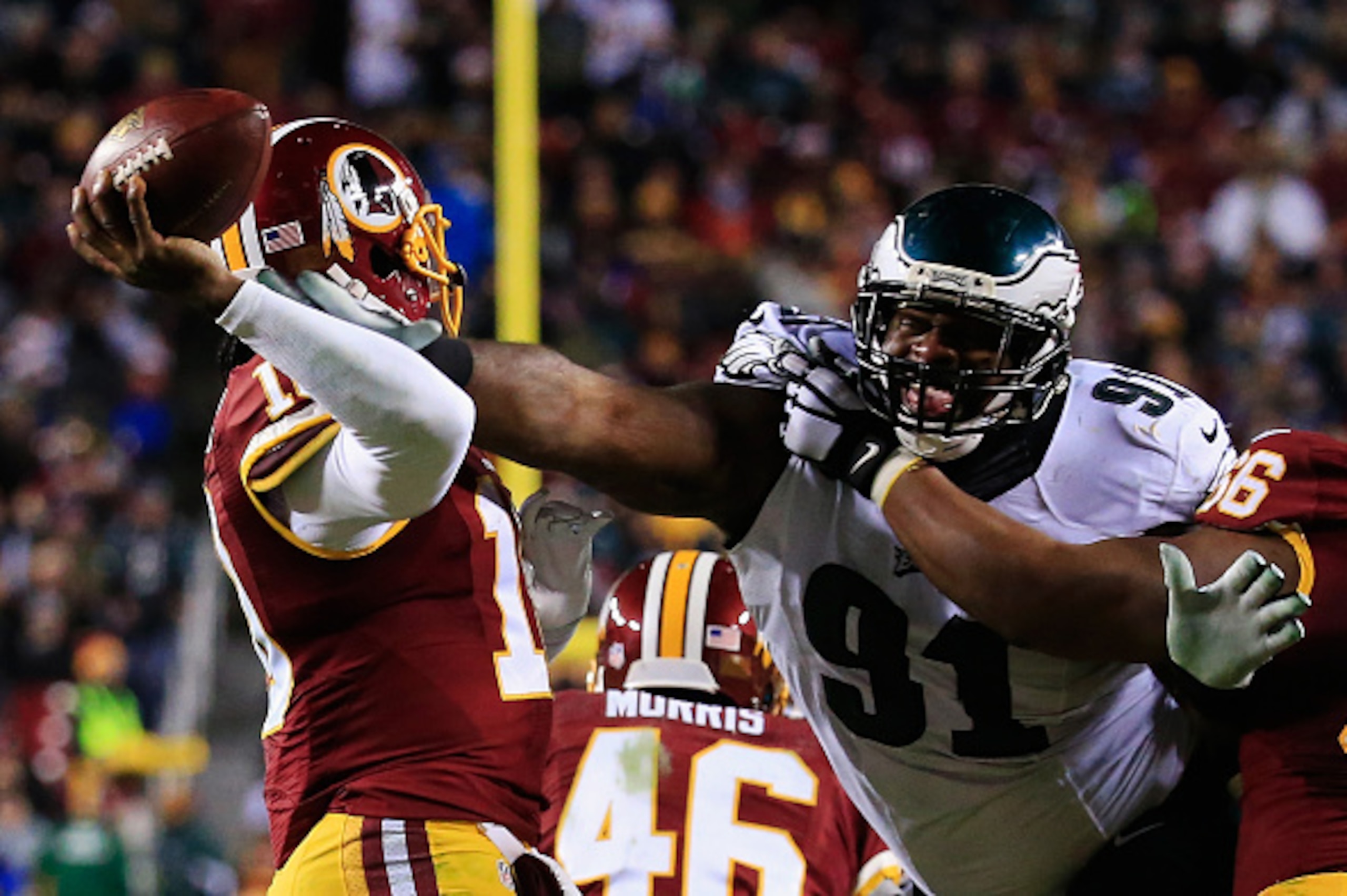 LANDOVER, MD - DECEMBER 20: Defensive end Fletcher Cox #91 of the Philadelphia Eagles sacks quarterback Robert Griffin III #10 of the Washington Redskins in the fourth quarter at FedExField on December 20, 2014 in Landover, Maryland. (Photo by Rob Carr/ LANDOVER, MD - DECEMBER 20: Defensive end Fletcher Cox #91 of the Philadelphia Eagles sacks quarterback Robert Griffin III #10 of the Washington Redskins in the fourth quarter at FedExField on December 20, 2014 in Landover, Maryland. (Photo by Rob Carr/