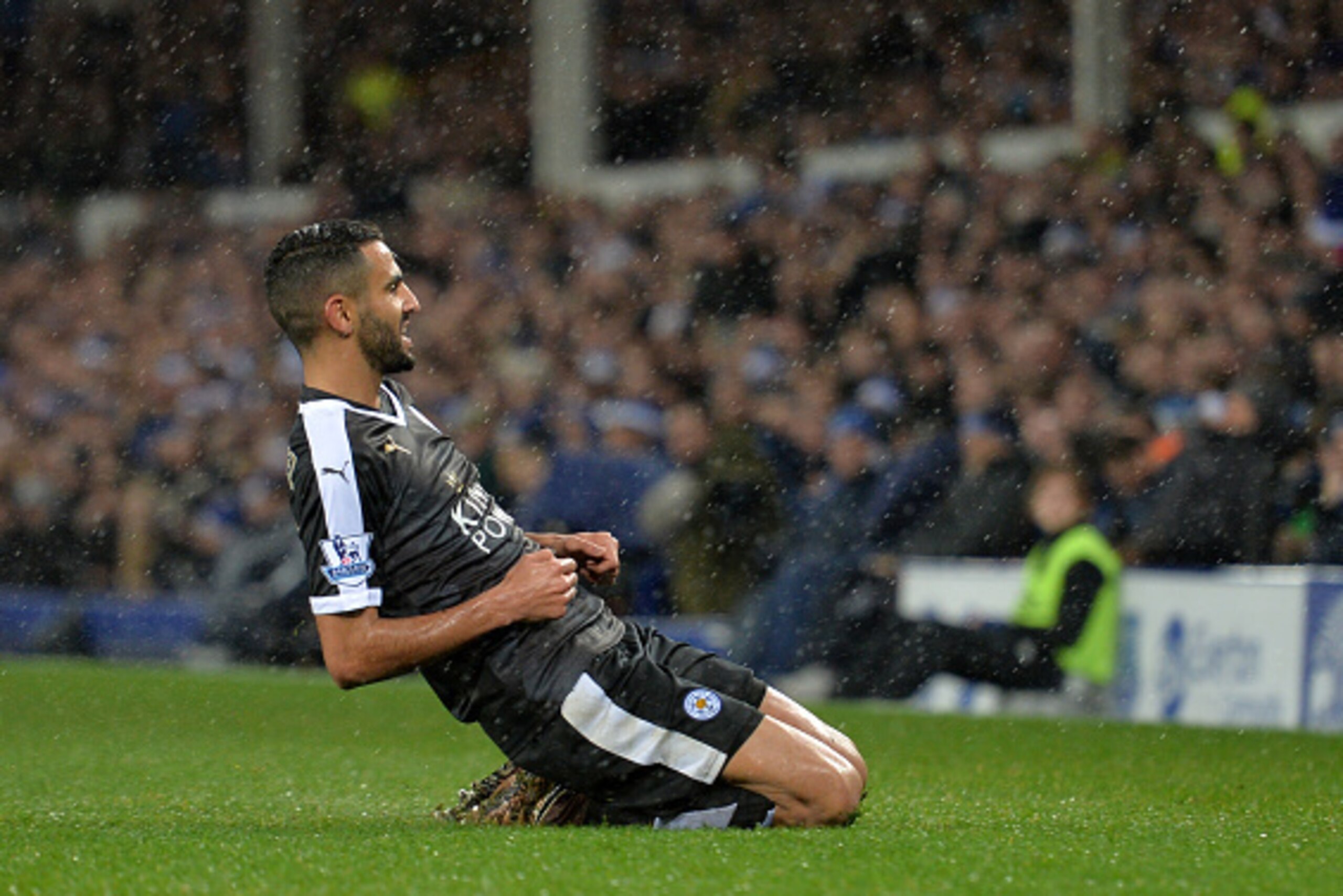 Leicester City's Algerian midfielder Riyad Mahrez celebrates after scoring their second goal during the English Premier League football match between Everton and Leicester City at Goodison Park in Liverpool, north west England on December 19, 2015. AFP PH