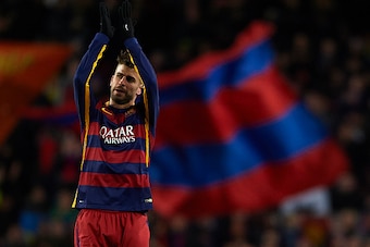 BARCELONA, SPAIN - NOVEMBER 24:  Gerard Pique of Barcelona greets the fans during the UEFA Champions League Group E match between FC Barcelona and AS Roma at Camp Nou on November 24, 2015 in Barcelona, Spain.  (Photo by Manuel Queimadelos Alonso/Getty Ima