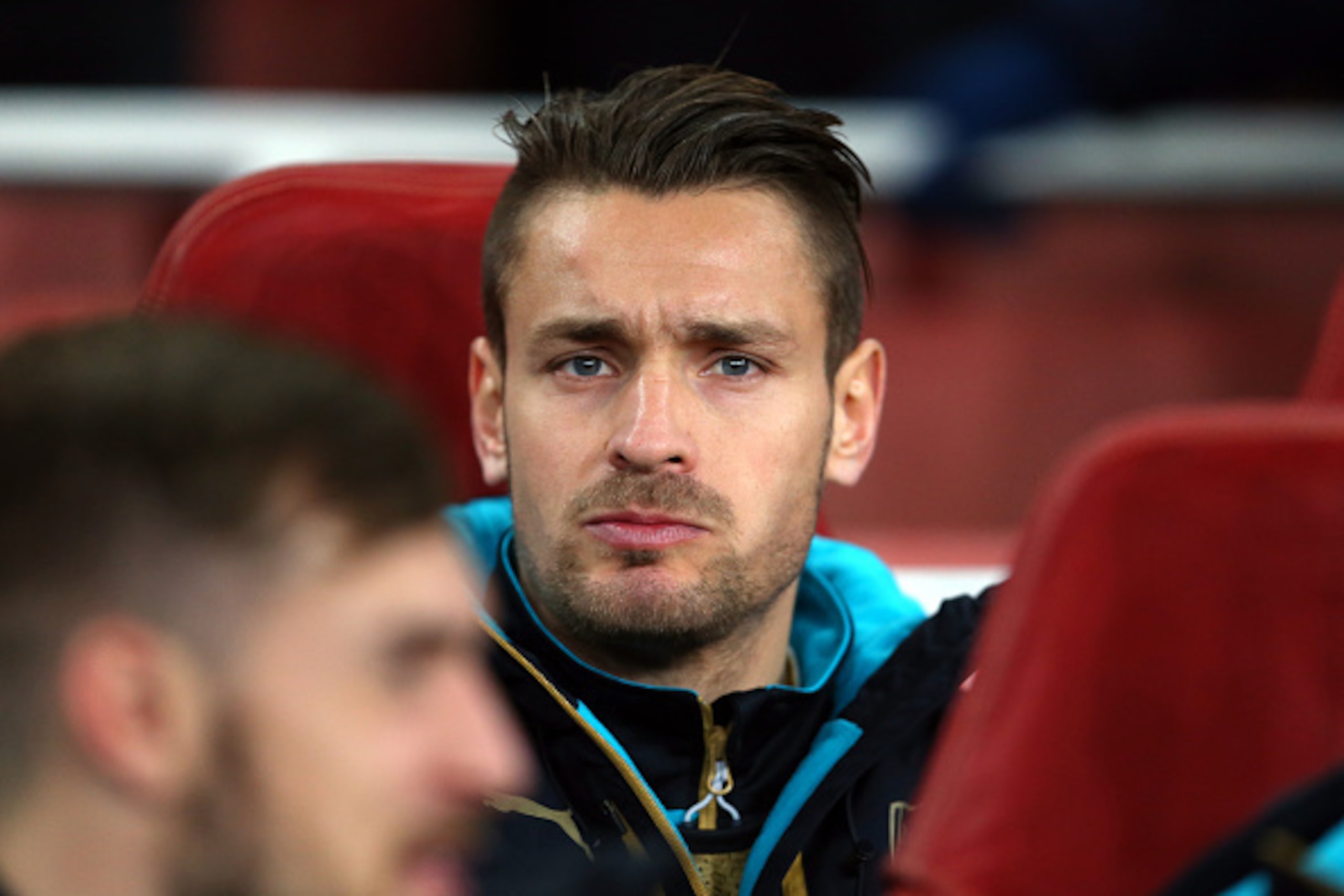 LONDON, ENGLAND - NOVEMBER 24:  Mathieu Debuchy of Arsenal on the bench during the UEFA Champions League match between Arsenal and Dinamo Zagreb at the Emirates Stadium on November 24, 2015 in London, United Kingdom.  (Photo by Catherine Ivill - AMA/Getty