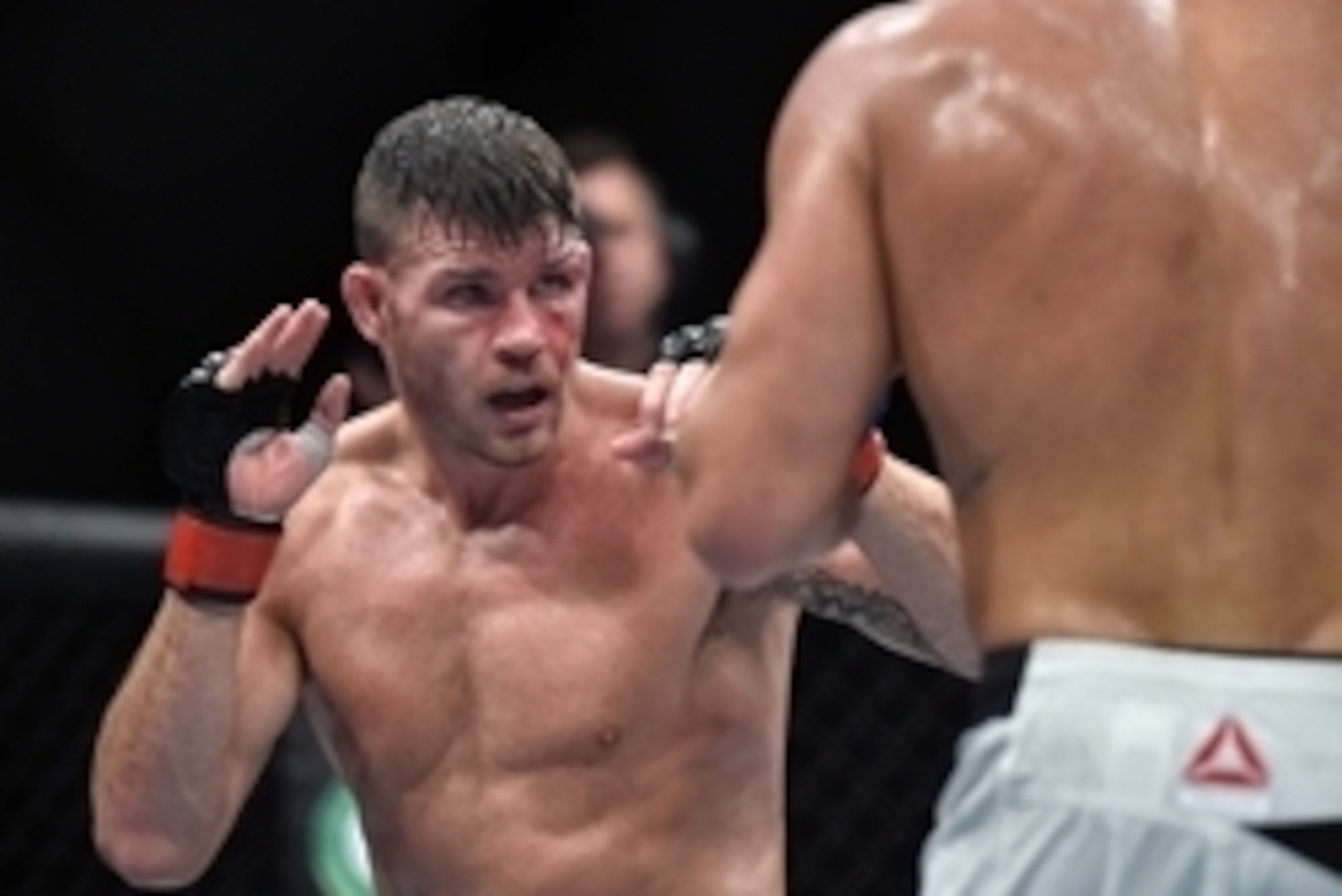 Jul 18, 2015; Glasgow, Lanarkshire, Scotland; Michael Bisping lines up a punch against Thales Leites at The SSE Hydro. Mandatory Credit: Steve Flynn-USA TODAY Sports