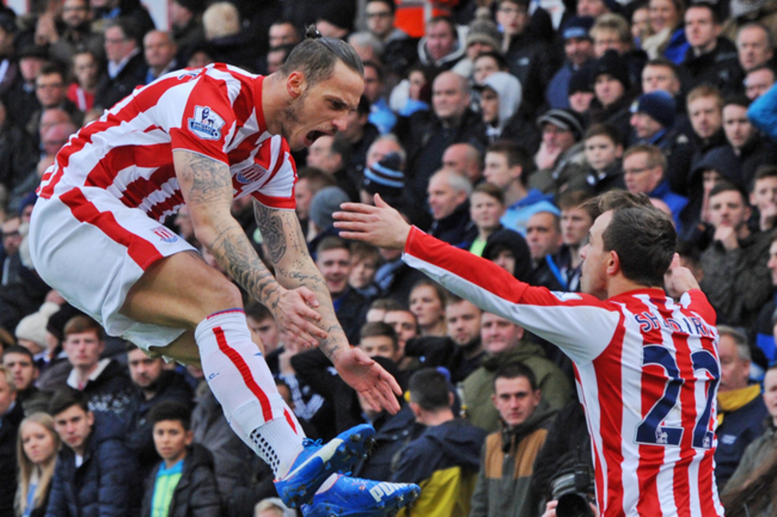 Shaqiri and Arnautovic celebrate the fruits of their partnership against Manchester City.