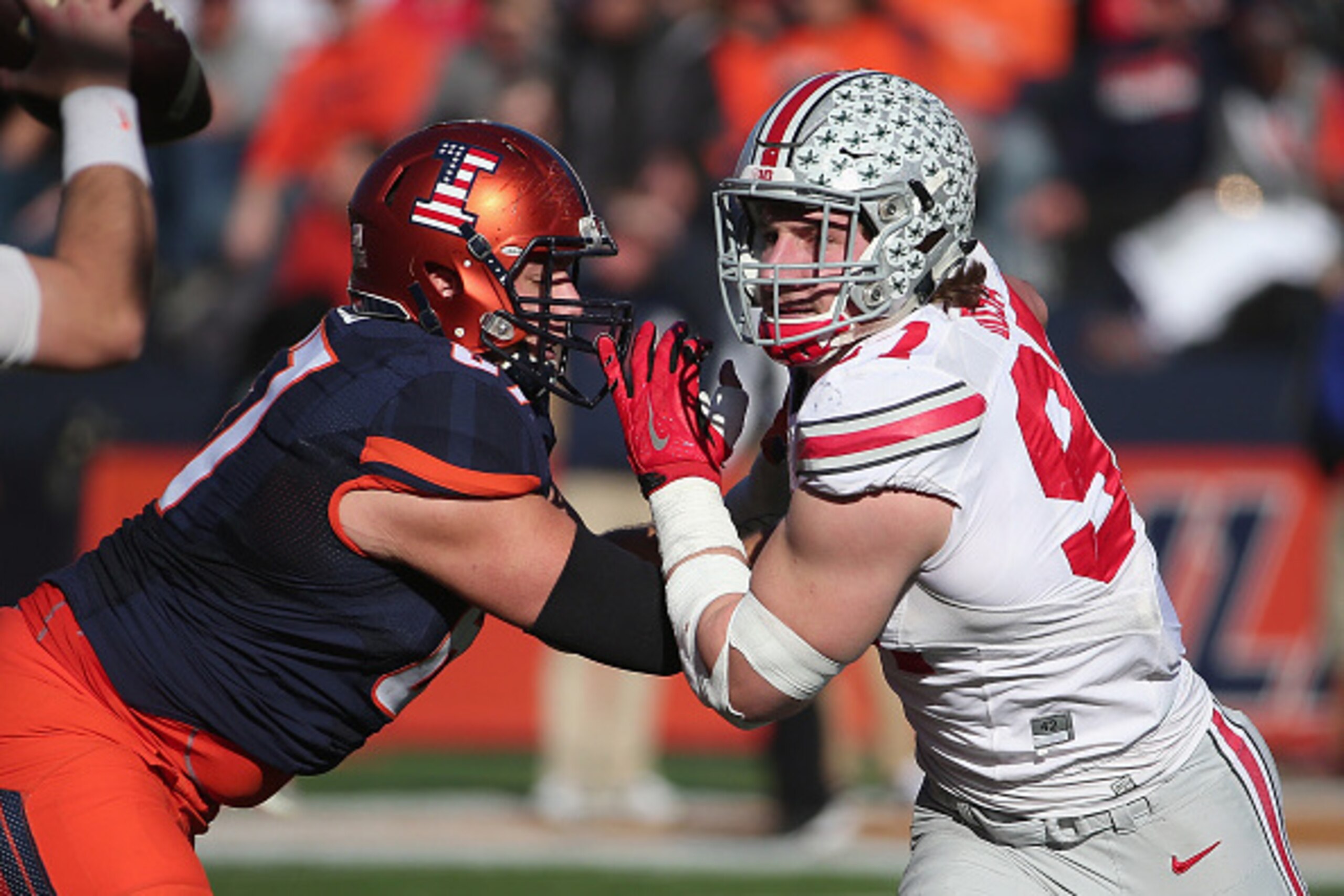 CHAMPAIGN, IL - NOVEMBER 14:  Joey Bosa #97 of the Ohio State Buckeyes rushes against Christian DiLauro #67 of the Illinois Fighting Illini at Memorial Stadium on November 14, 2015 in Champaign, Illinois.  (Photo by Jonathan Daniel/Getty Images)