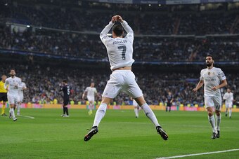 MADRID, SPAIN - DECEMBER 08:  Cristiano Ronaldo of Real Madrid celebrates after scoring Real's 6th goal during the UEFA Champions League Group A match between Real Madrid CF and Malmo FF at the Santiago Bernabeu stadium on December 8, 2015 in Madrid, Spai