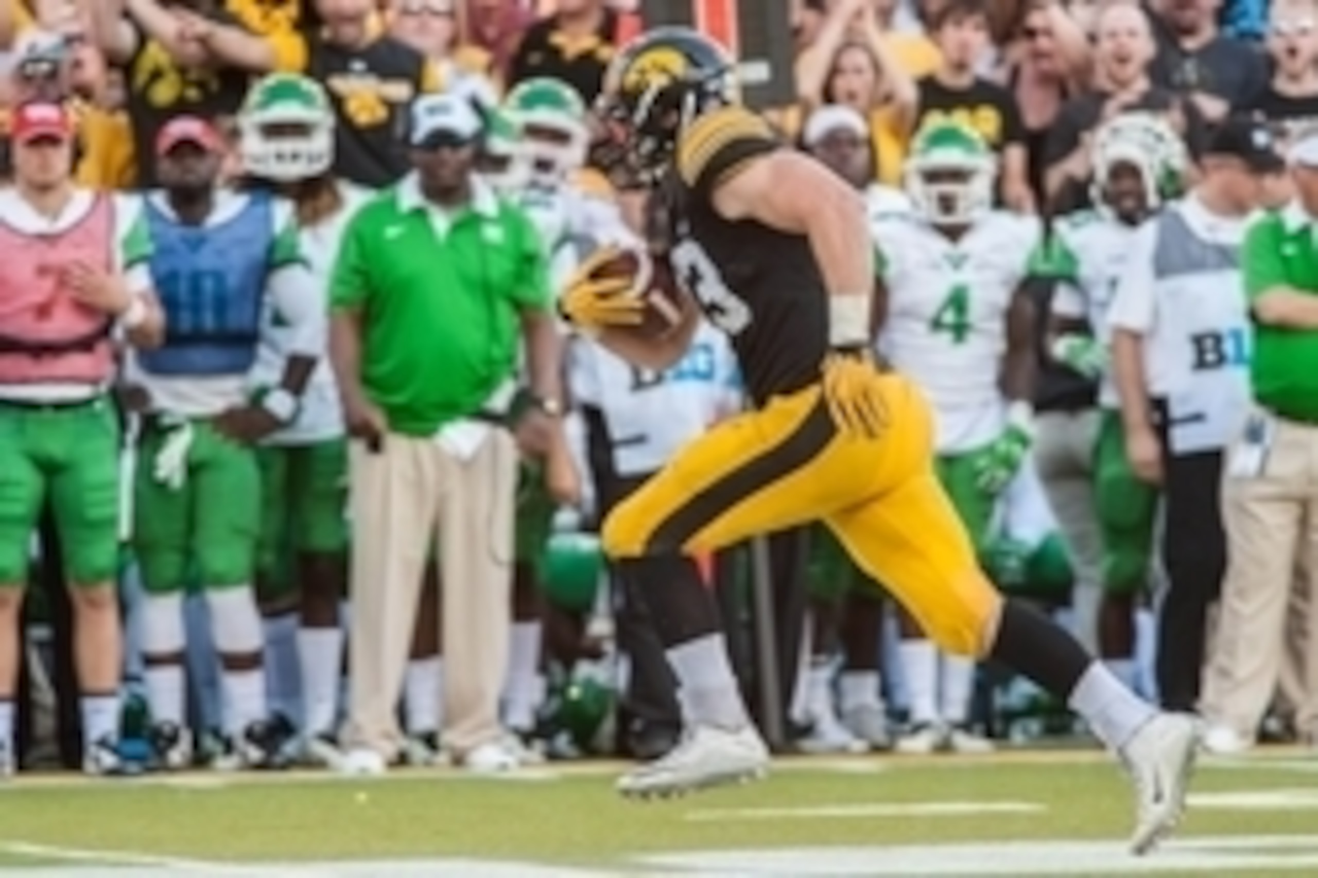 Sep 26, 2015; Iowa City, IA, USA; Iowa Hawkeyes linebacker Josey Jewell (43) runs back an interception 34 yards for a touchdown during the second half against the North Texas Mean Green at Kinnick Stadium. The Hawkeyes won 62-16. Mandatory Credit: Jeffrey