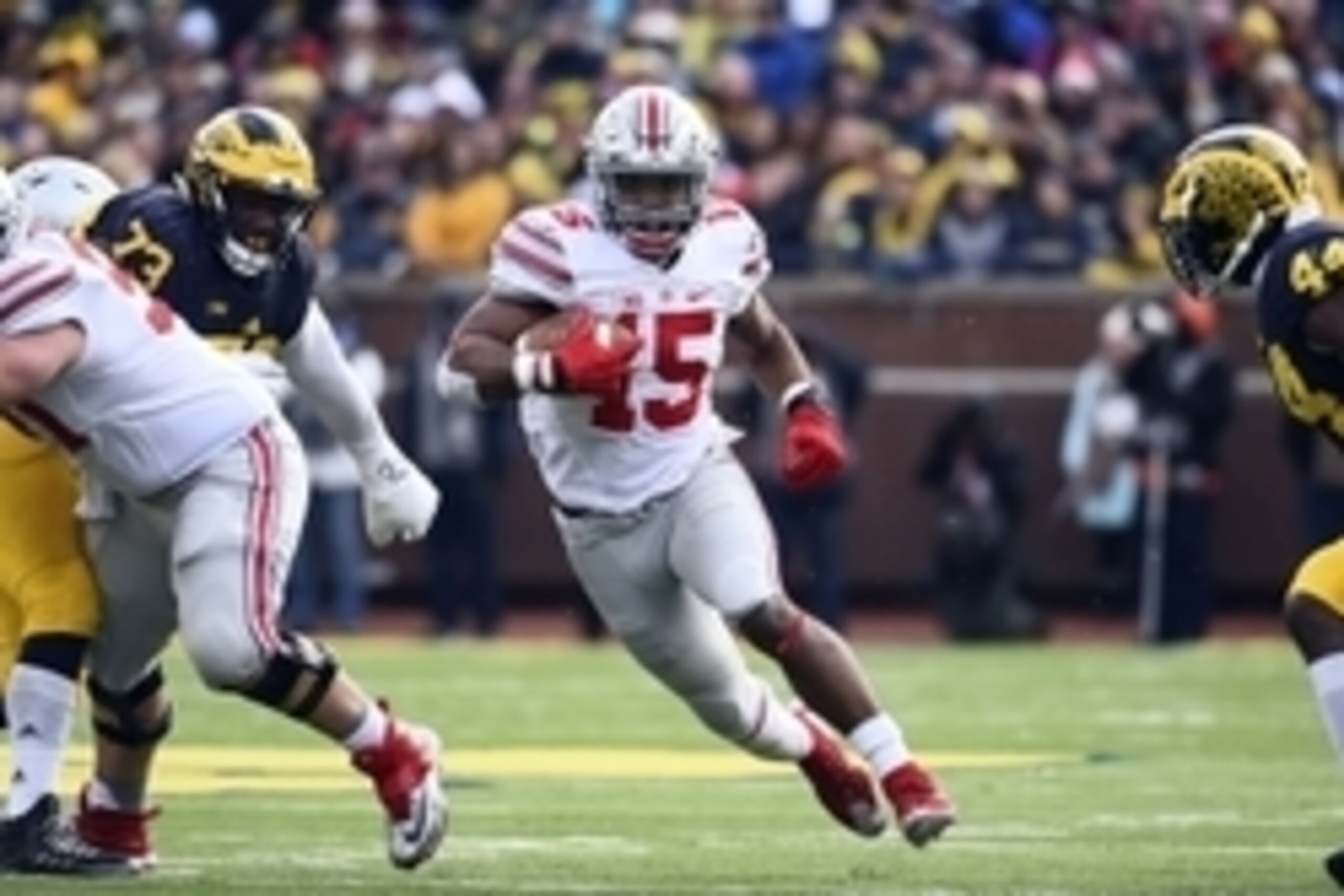 Nov 28, 2015; Ann Arbor, MI, USA; Ohio State Buckeyes running back Ezekiel Elliott (15) rushes in the third quarter against the Michigan Wolverines at Michigan Stadium. Mandatory Credit: Tim Fuller-USA TODAY Sports