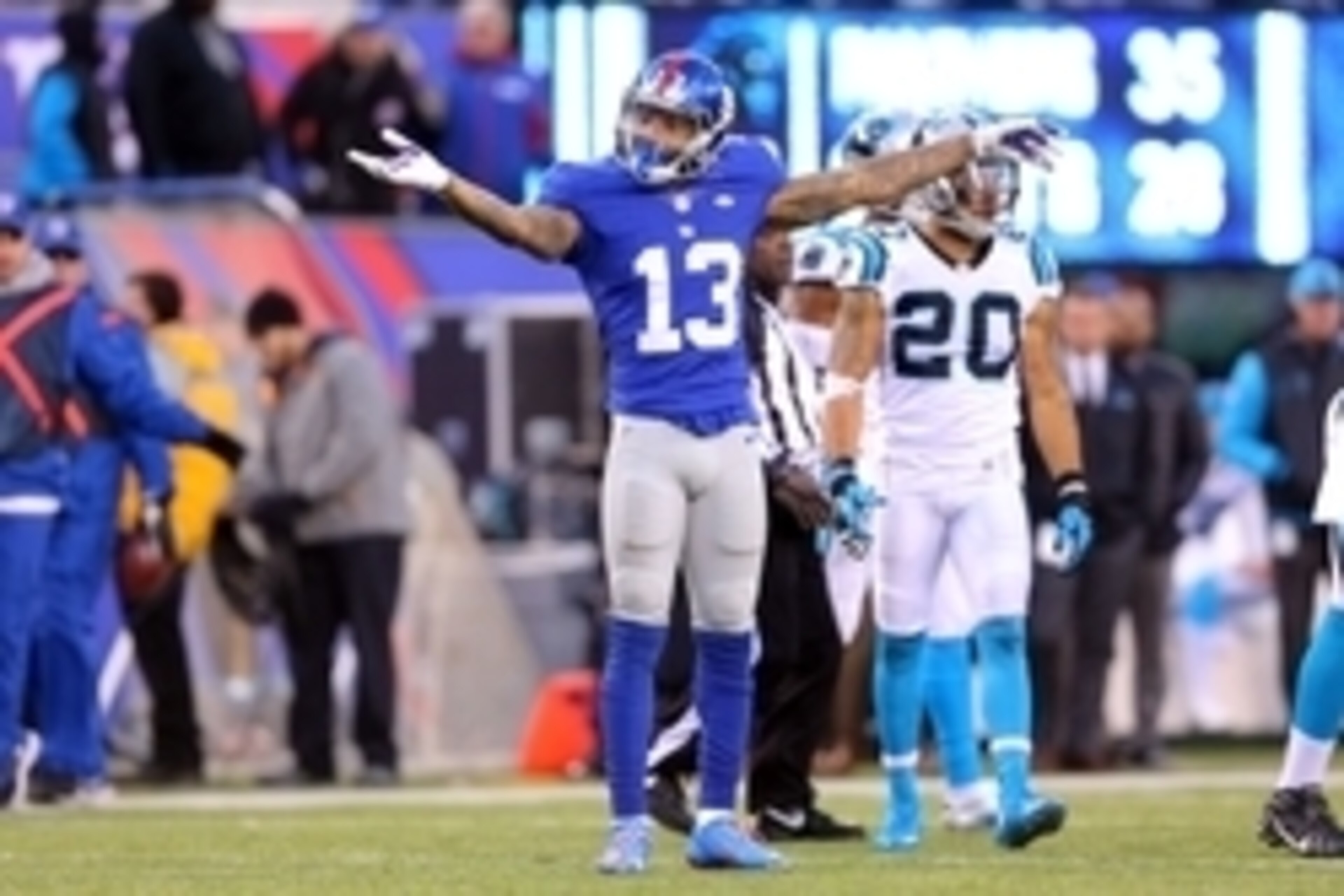 Dec 20, 2015; East Rutherford, NJ, USA; New York Giants wide receiver Odell Beckham Jr. (13) signals first down after a catch and run against the Carolina Panthers during the fourth quarter at MetLife Stadium. The Panthers defeated the Giants 38-35. Manda Dec 20, 2015; East Rutherford, NJ, USA; New York Giants wide receiver Odell Beckham Jr. (13) signals first down after a catch and run against the Carolina Panthers during the fourth quarter at MetLife Stadium. The Panthers defeated the Giants 38-35. Manda